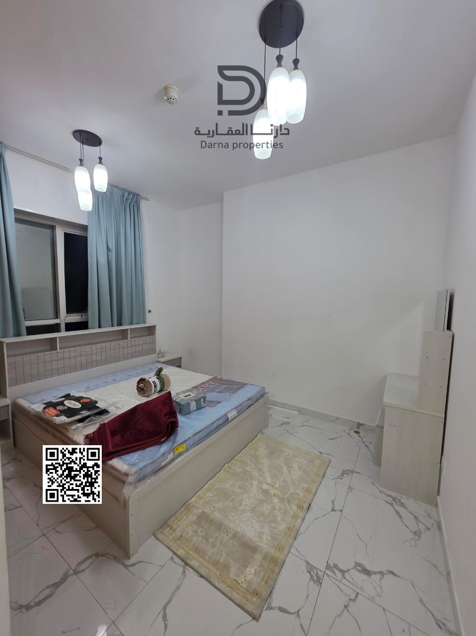Own a spacious 2-bedroom apartment with a living room in Al Waha Towers, featuring high-quality finishes and conveniently located near all essential s