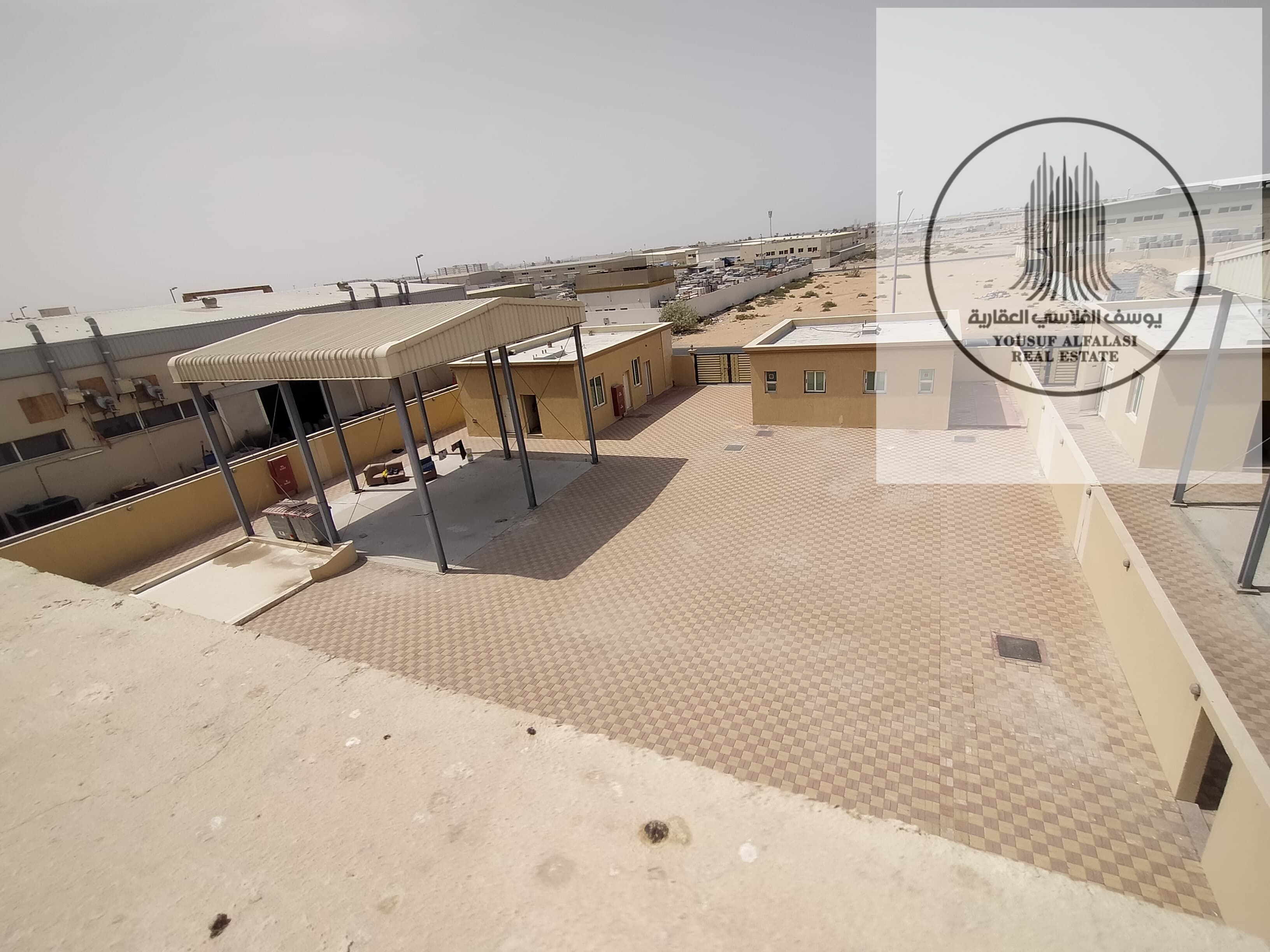 Industrial land, 155KW, with staff quarters, office, shop, awnings, prime location