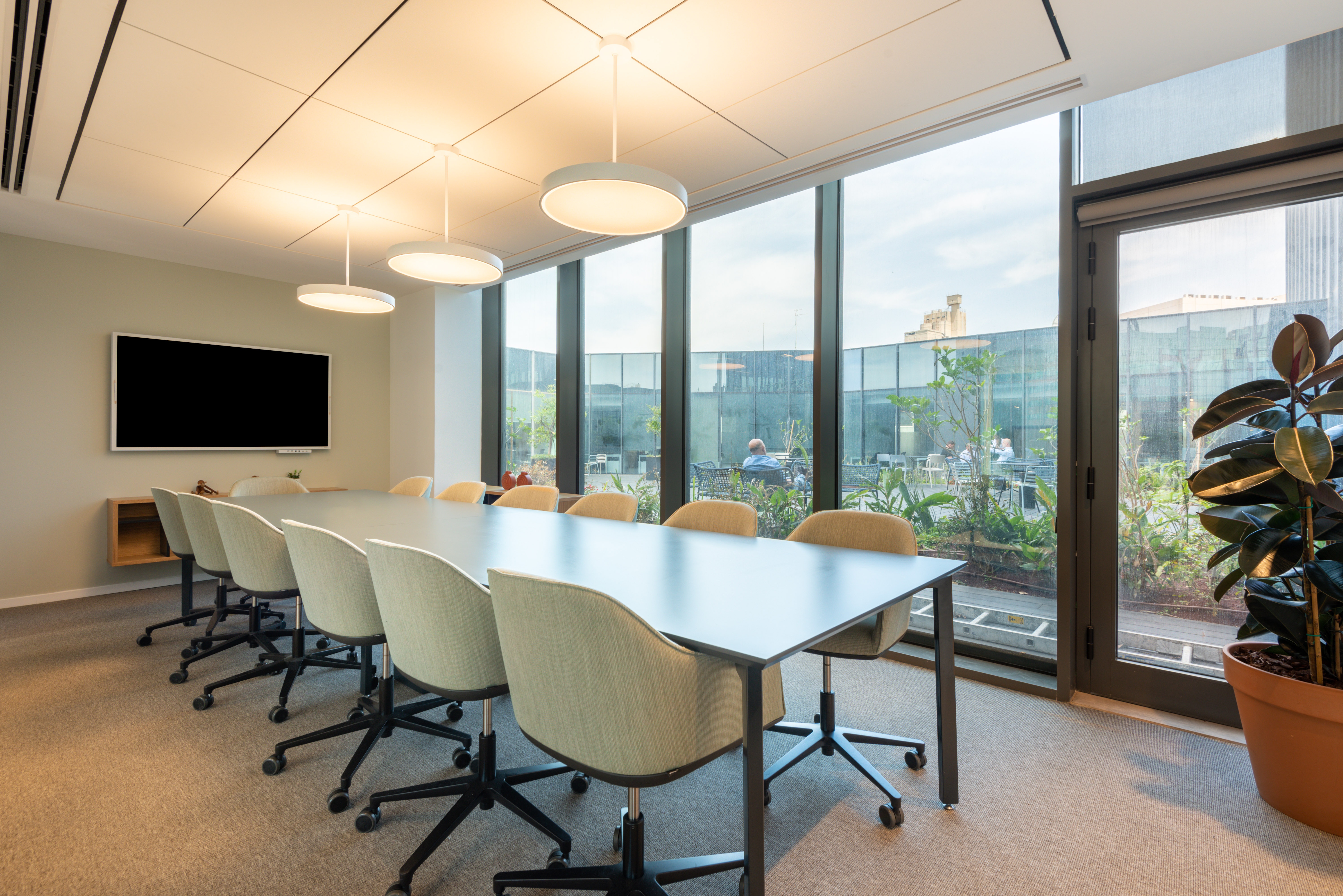Fully serviced open plan office space for you and your team in Spaces CommerCity Dubai
