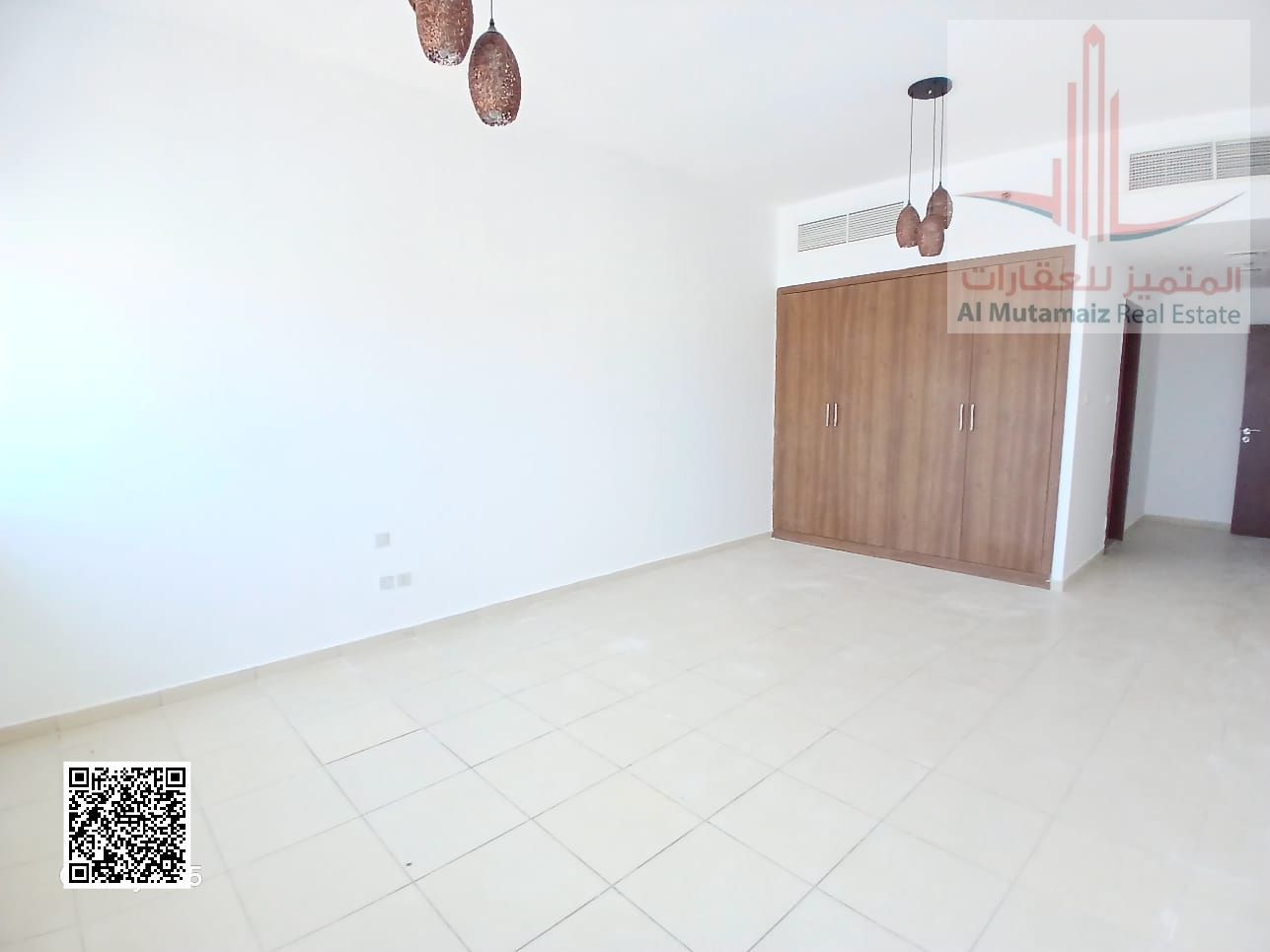Apartment for sale in Ajman Towers, 2 master bedrooms and living room, 1,458 sq. ft. , with balcony and sea & garden view, 14th floor, Tower 12, ready