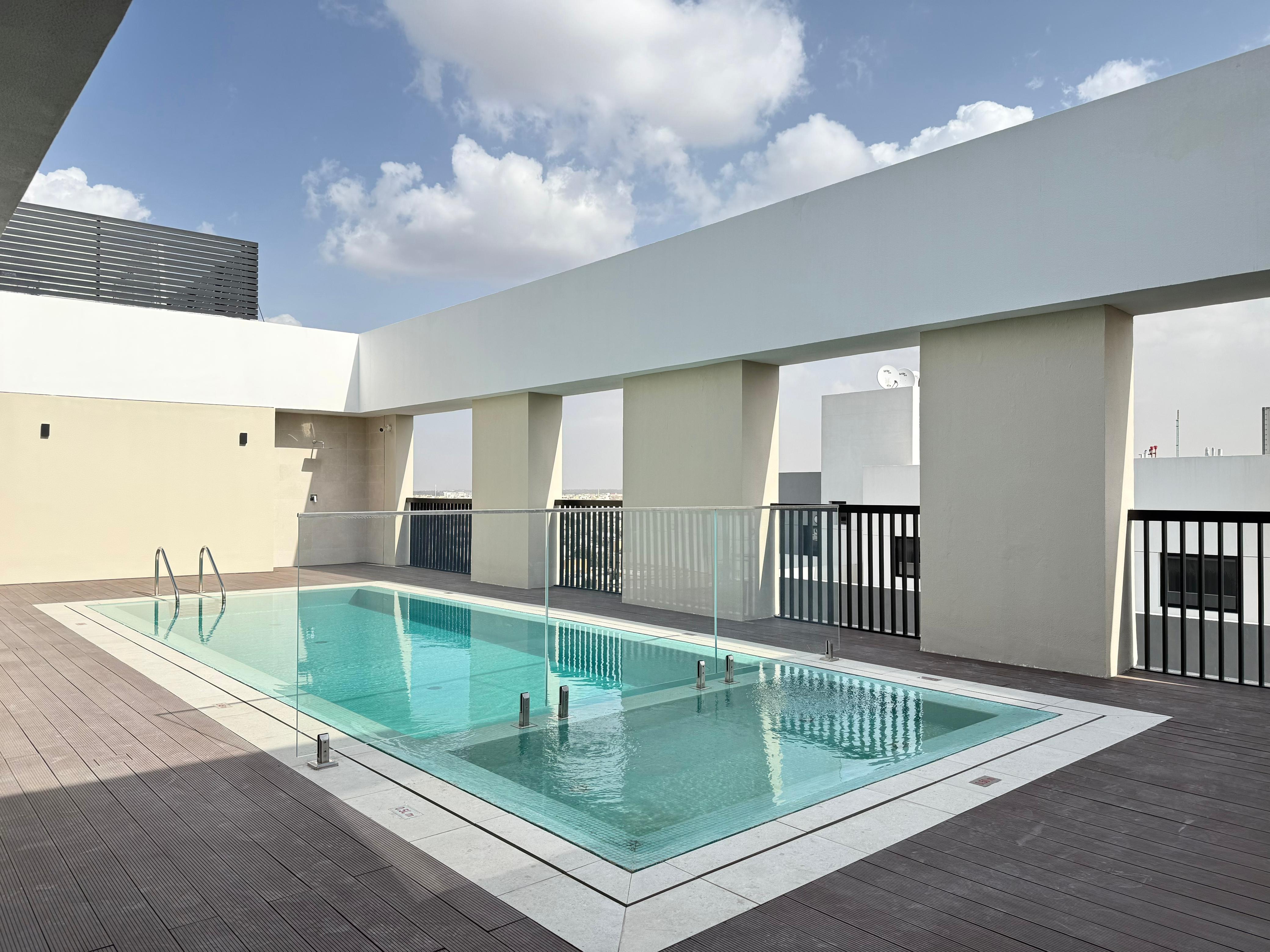 BRAND NEW SPACIOUS 1 BEDROOM APARTMENT WITH CLOSED KITCHEN,2 BALCONIES HAVING GYM,POOL AND COVERED PARKING.