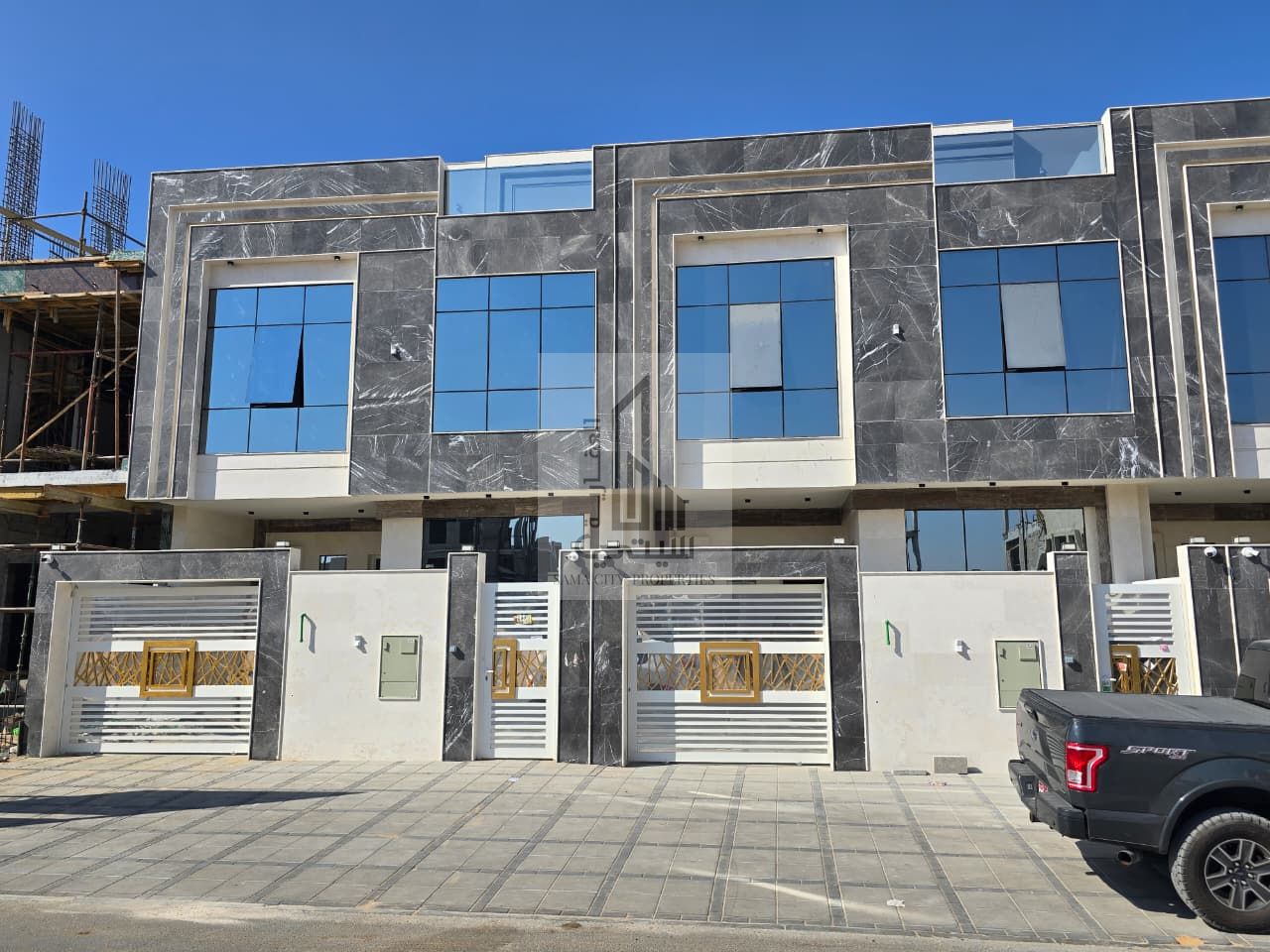Townhouse villa (4) modern style, high quality materials with stone 4 master room & Big Living room & Majlis & Big maid room master Two balcony Build up area 297 sqmt, Land 160 sqmt , asking 1.35m including registration