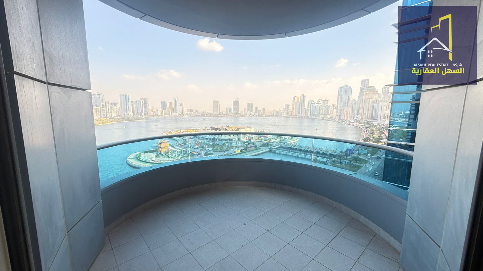 Luxury apartment for rent in Al Majaz 3, three bedrooms, living room with balcony