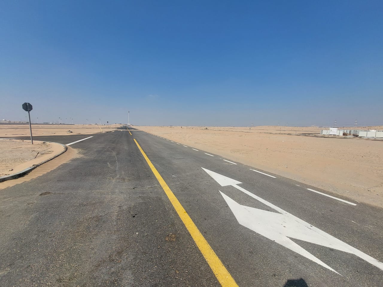 Commercial land for sale in Rawdat Al Qurt area, on the main road in Al Ruwaidat suburb, Sharjah.
