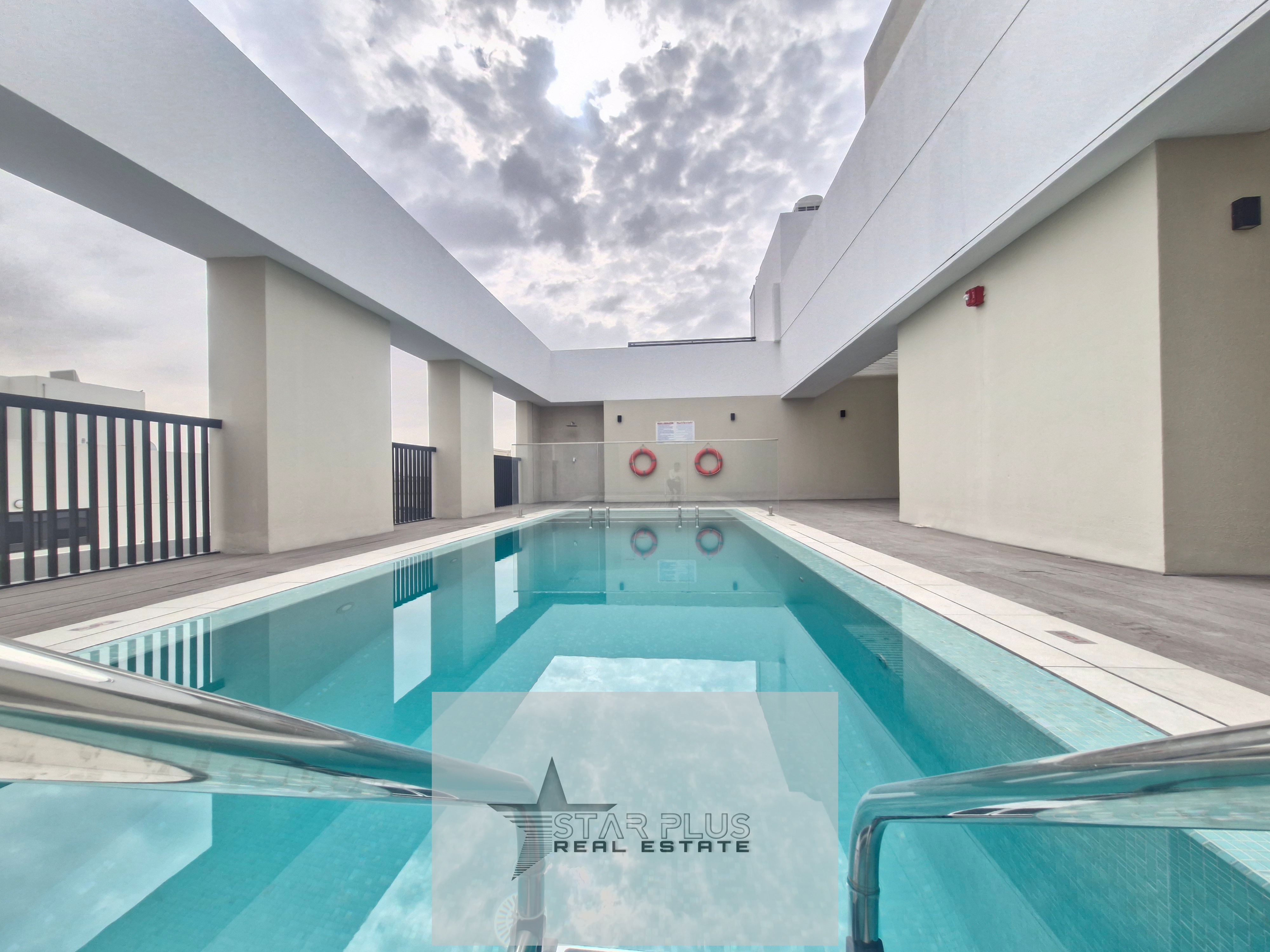 BRAND NEW SPACIOUS AND LUXURIOUS 1 BEDROOM APARTMENT WITH CLOSED KITCHEN,2 BALCONIES HAVING GYMNASIOUM ,POOL AND COVERED PARKING.