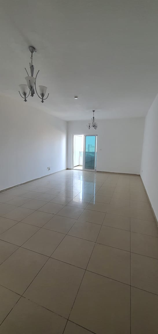 For Sale 2-Bedroom Apartment with Stunning Front View of Al Taawun Street