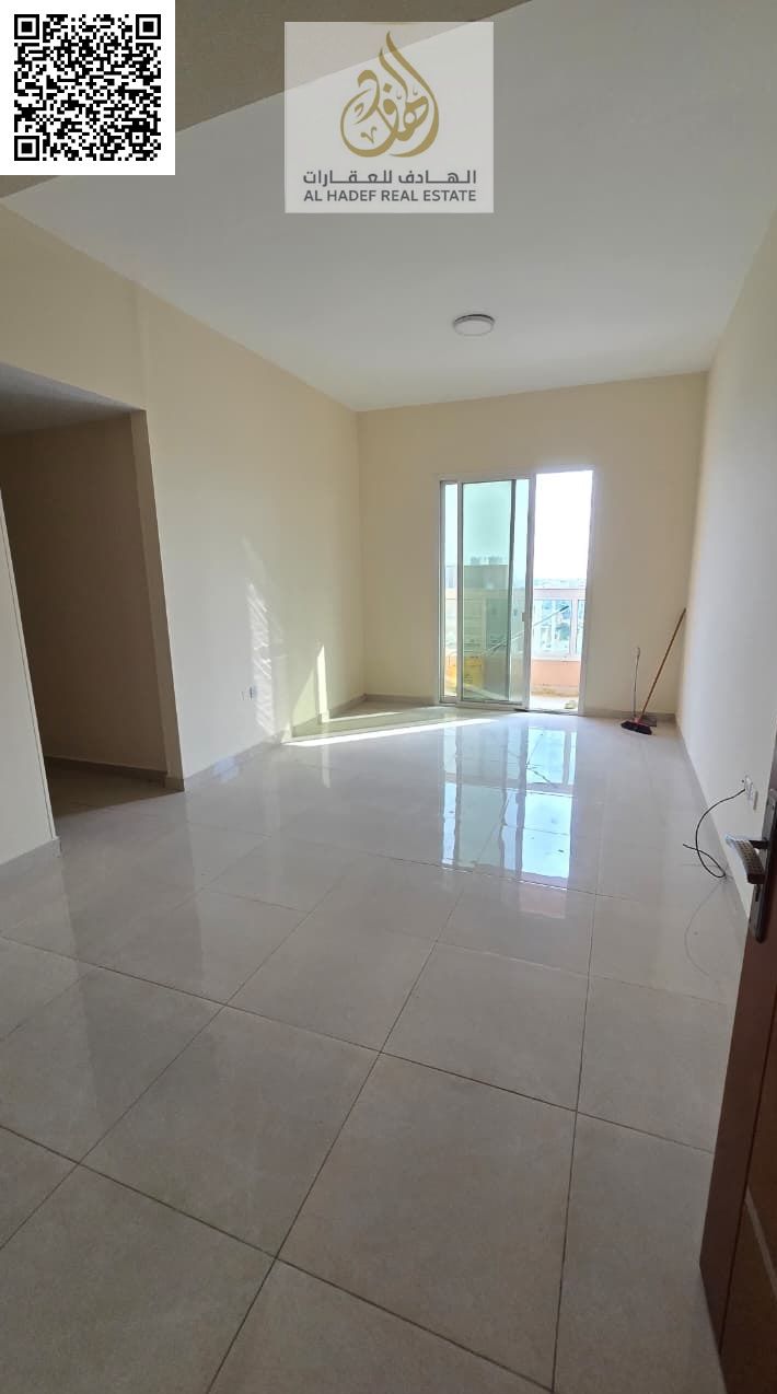 Annual Rent in Ajman: Spacious 2-Bedroom Apartment with 3 Bathrooms, Balcony, Large Kitchen, and Excellent Finishing in a Prime Location in Al Rooba n