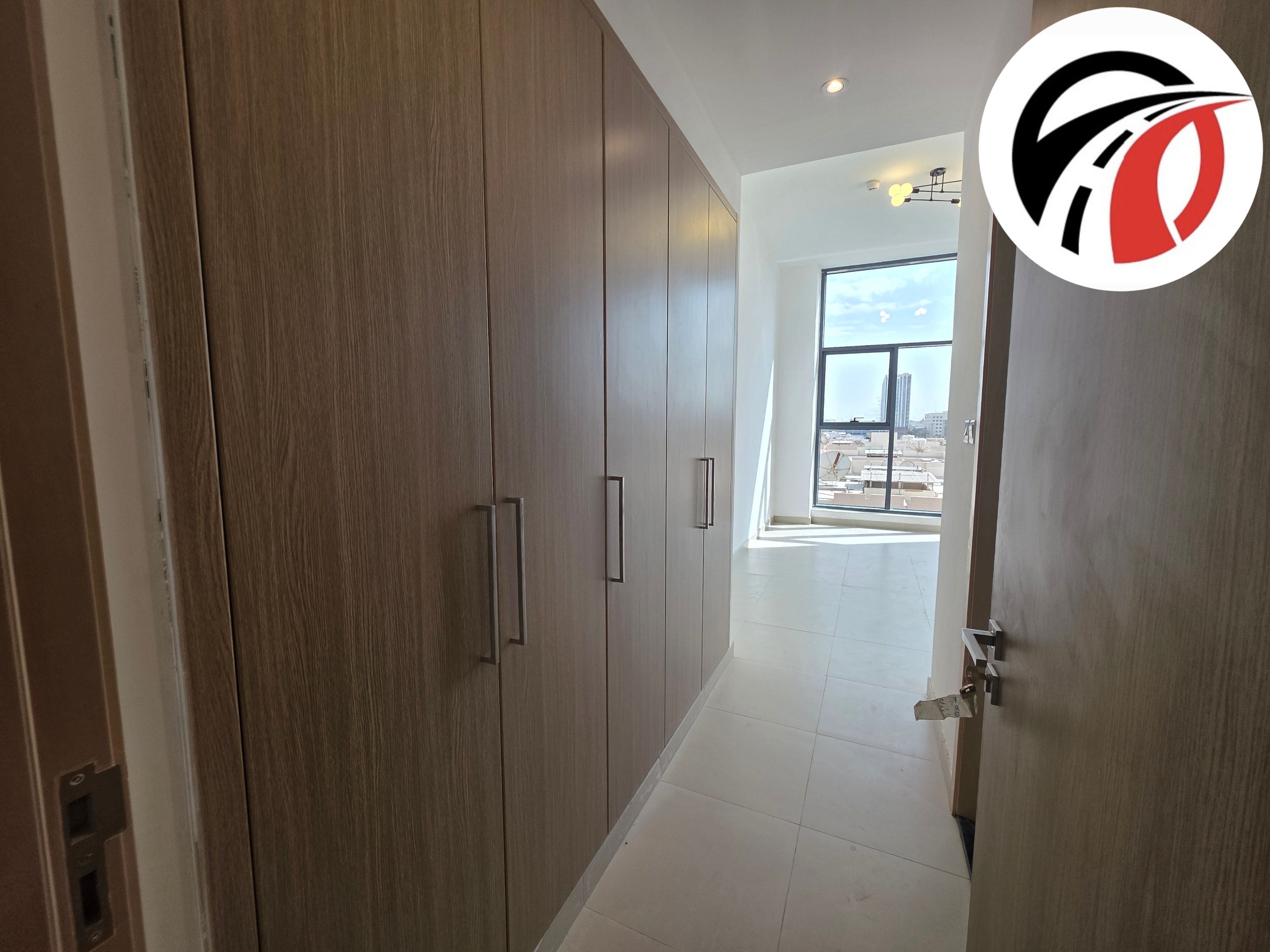 Located in front of the Metro, this brand new two-bedroom apartment with a maid's room is available for immediate booking.