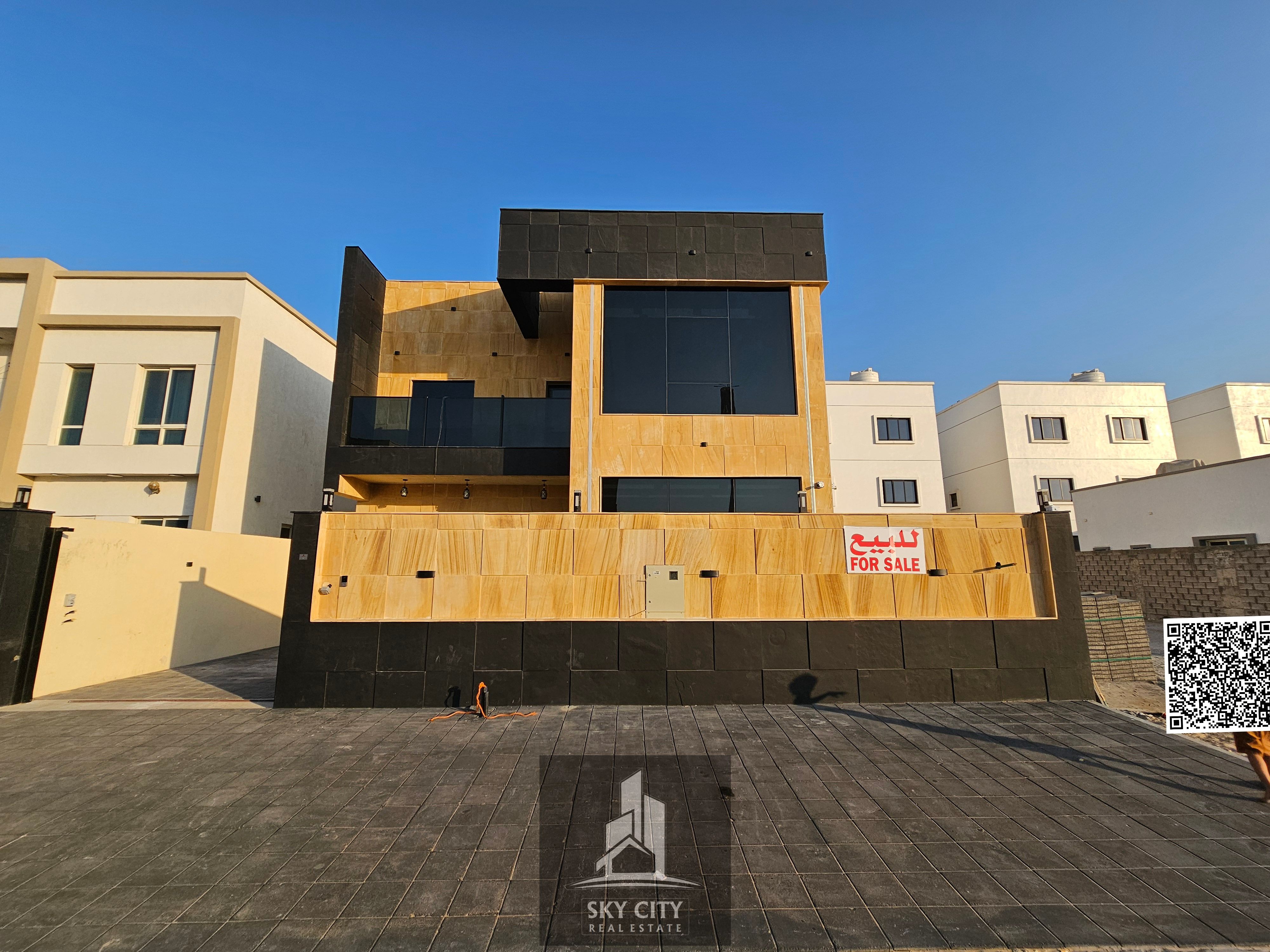 Villa for sale directly on Sheikh Mohammed Bin Zayed Road, 5 master bedrooms, freehold, prime location at a competitive price