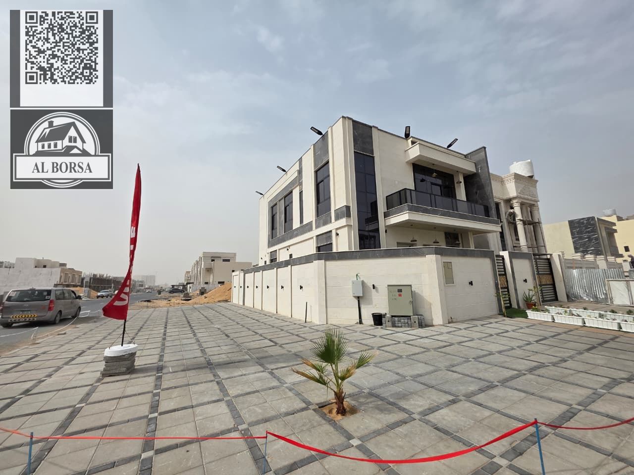 For sale a villa in Al Helio 2 in Ajman, 5 master bedrooms, a majlis, a hall, a maid's room, and a store