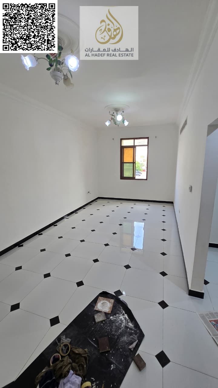 One-bedroom apartment with a living room and two bathrooms, featuring the finest finishes and decor in Ajman. For annual rent in Ajman. **Separate o
