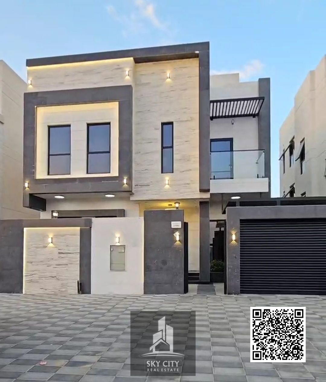 Al-Haliyo, Ajman, behind Emirates Towers on Sheikh Mohammed Bin Rashid Street. A villa ready for occupancy with electricity, water, air conditioning, and a swimming pool. Central air conditioning. Ground floor, first floor, and roof. Freehold ownership.