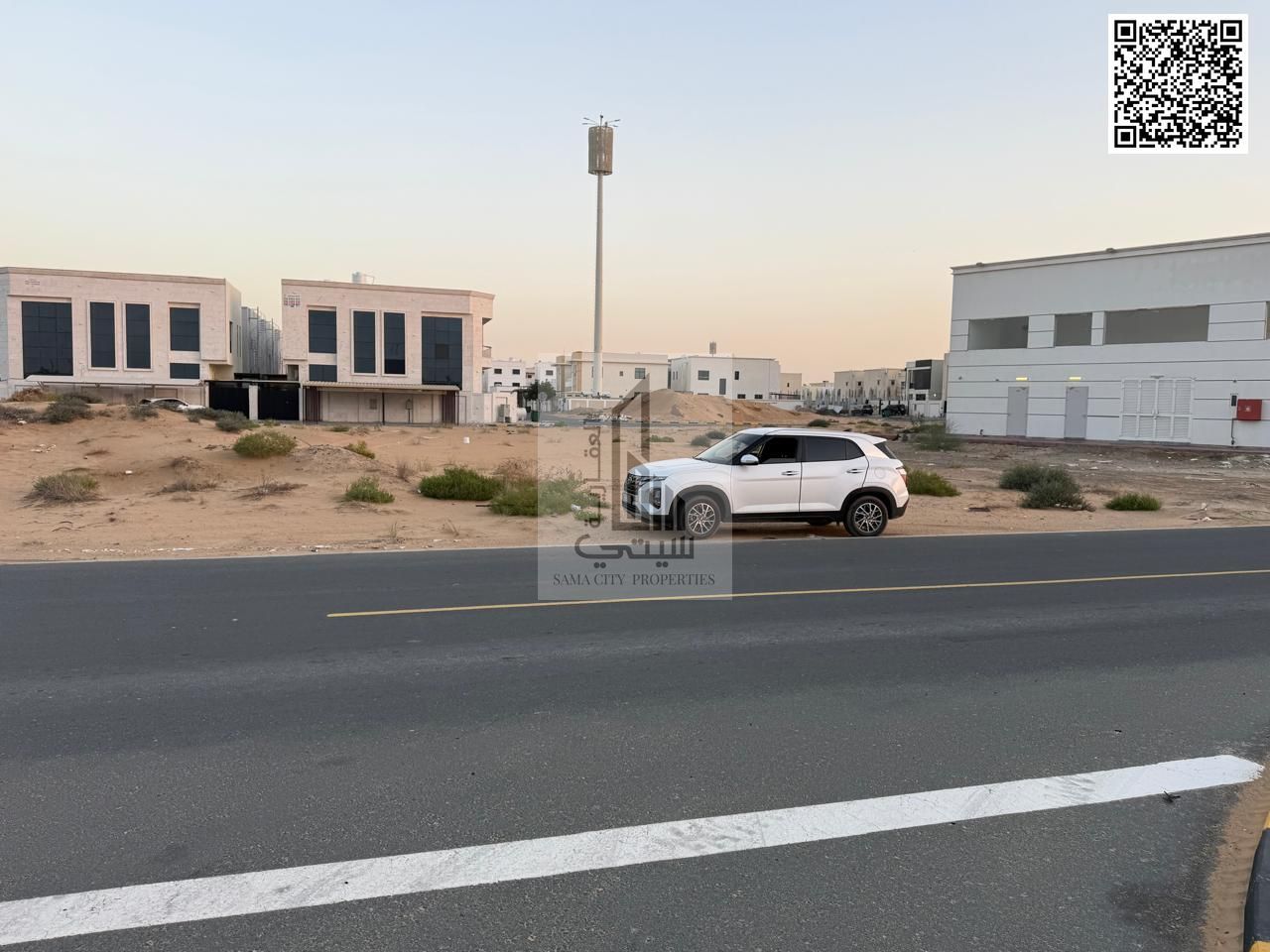 Corner plot for sale, residential/commercial, permit for ground floor and two floors, on Sheikh Mohammed Bin Zayed Road