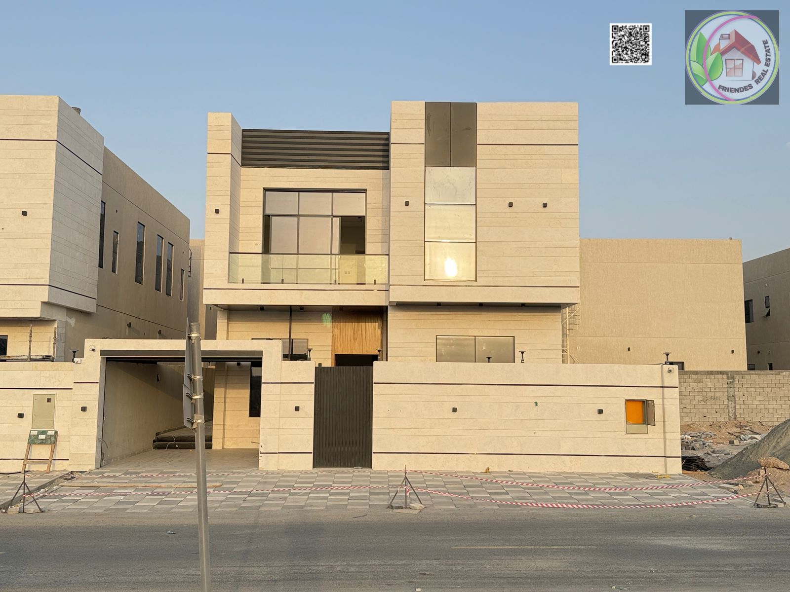 Luxury two-story villa for sale at an attractive price, including registration and ownership fees. Features central air conditioning. Located opposite