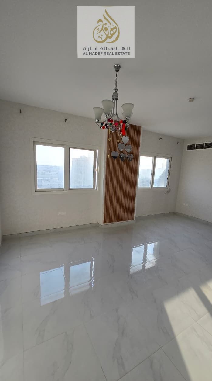 Annual rent in Ajman, Al Jurf 3 area, next to the school and Woodlim Park Ajman, near Ajman Driving Academy. Two bedrooms, living room, balcony, centr