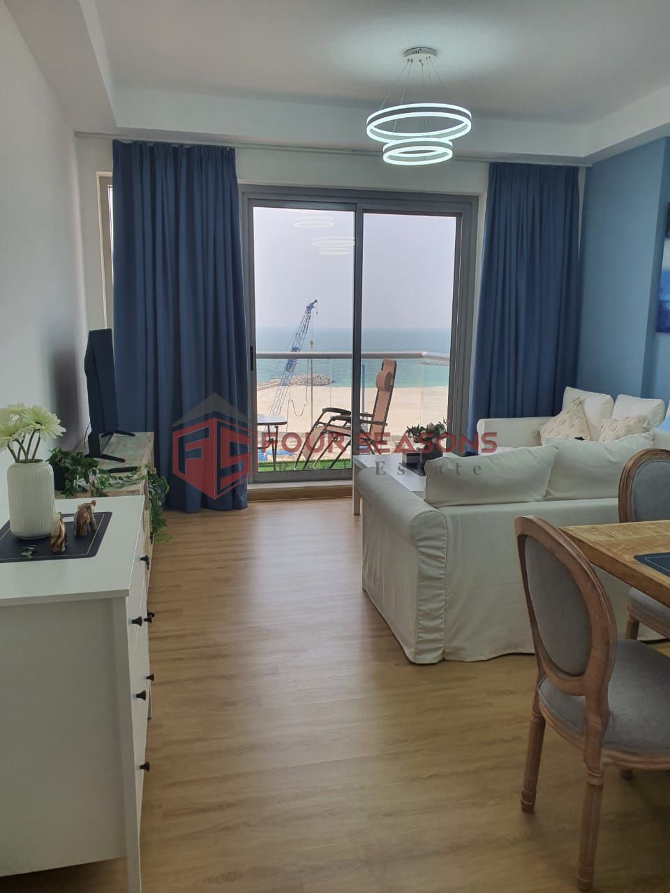 High-Floor Fully Furnished Freehold One-Bedroom Apartment Featuring Panoramic Sea Views