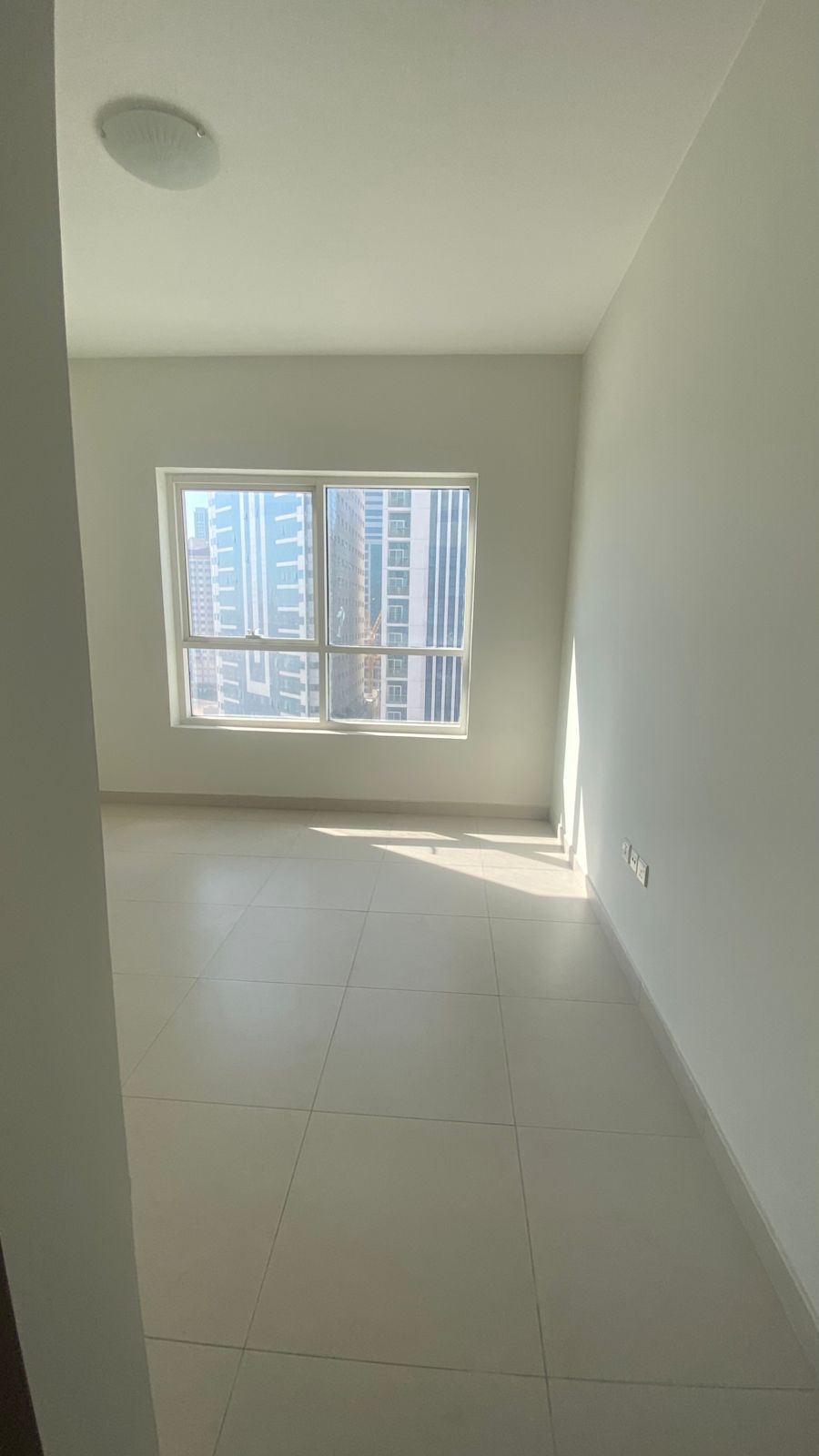 Two bedroom apartment with living room, second tenant, in Al Taawun Sharjah. Open view, free parking, close to all services and easy access to Dubai.