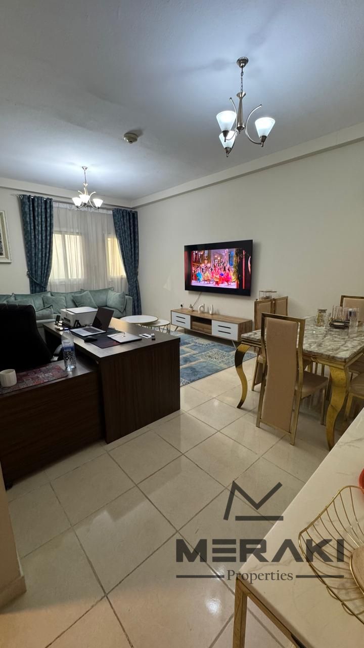 One-bedroom apartment with a living room for annual rent in Orient Towers, with a creek view