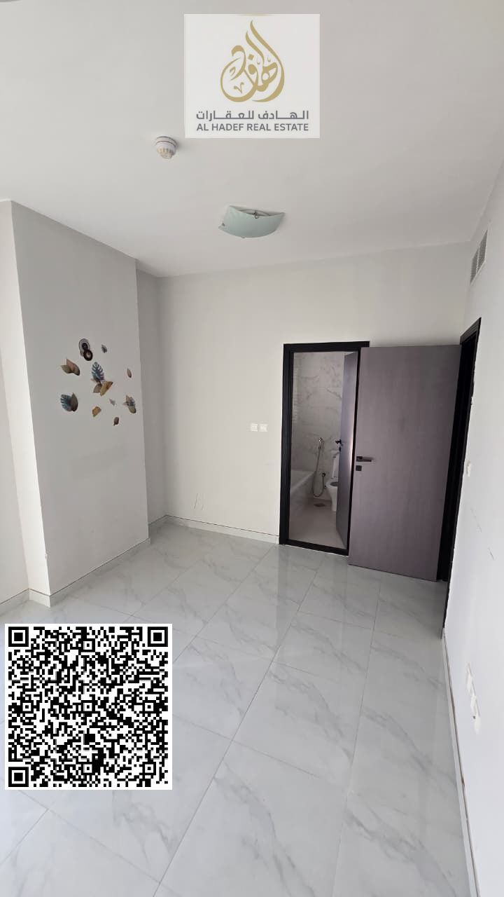 Two bedrooms and a living room with a balcony, three bathrooms