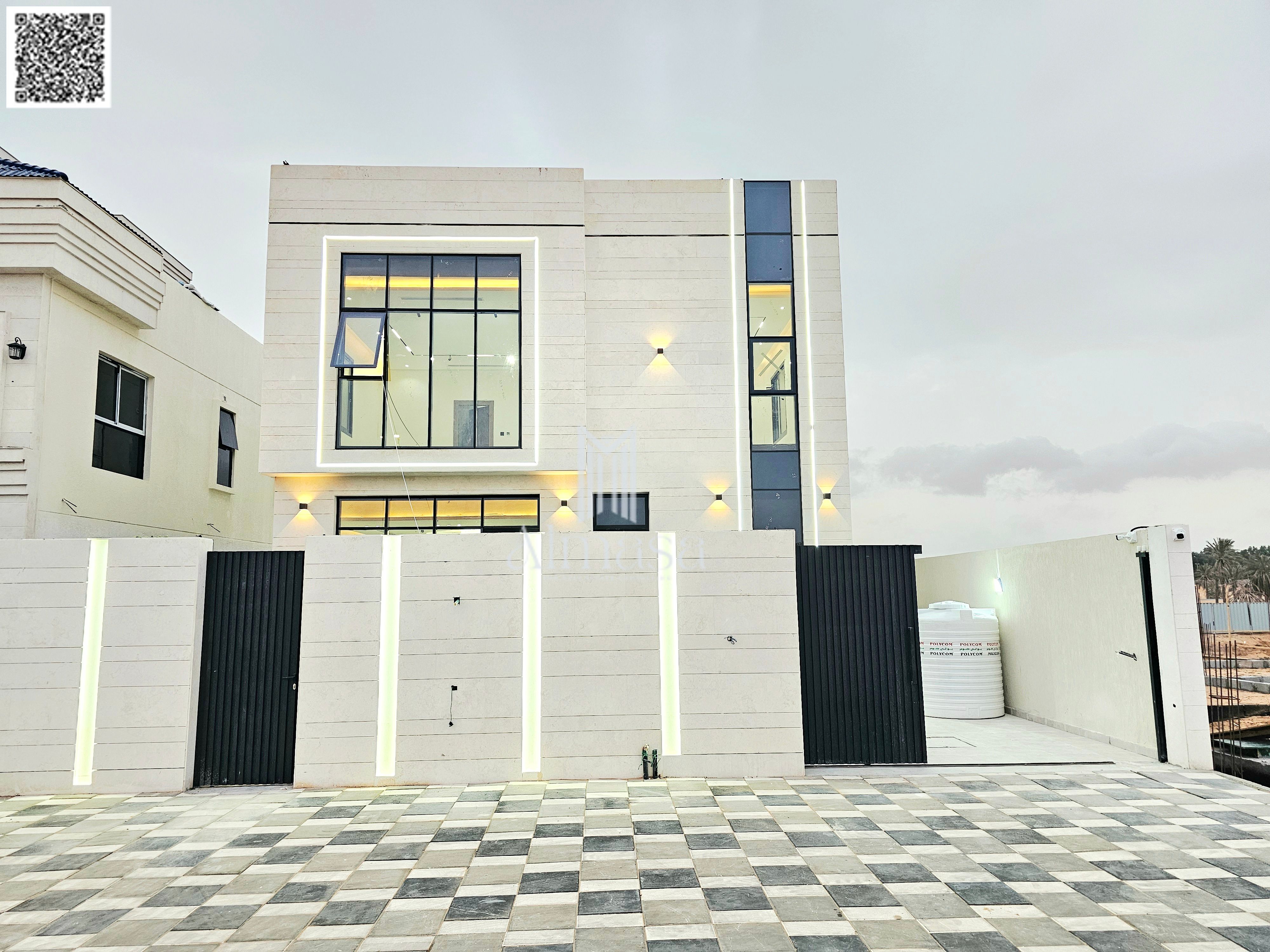 Modern 5-bedroom villa on a main street with a large terrace in front of the villa