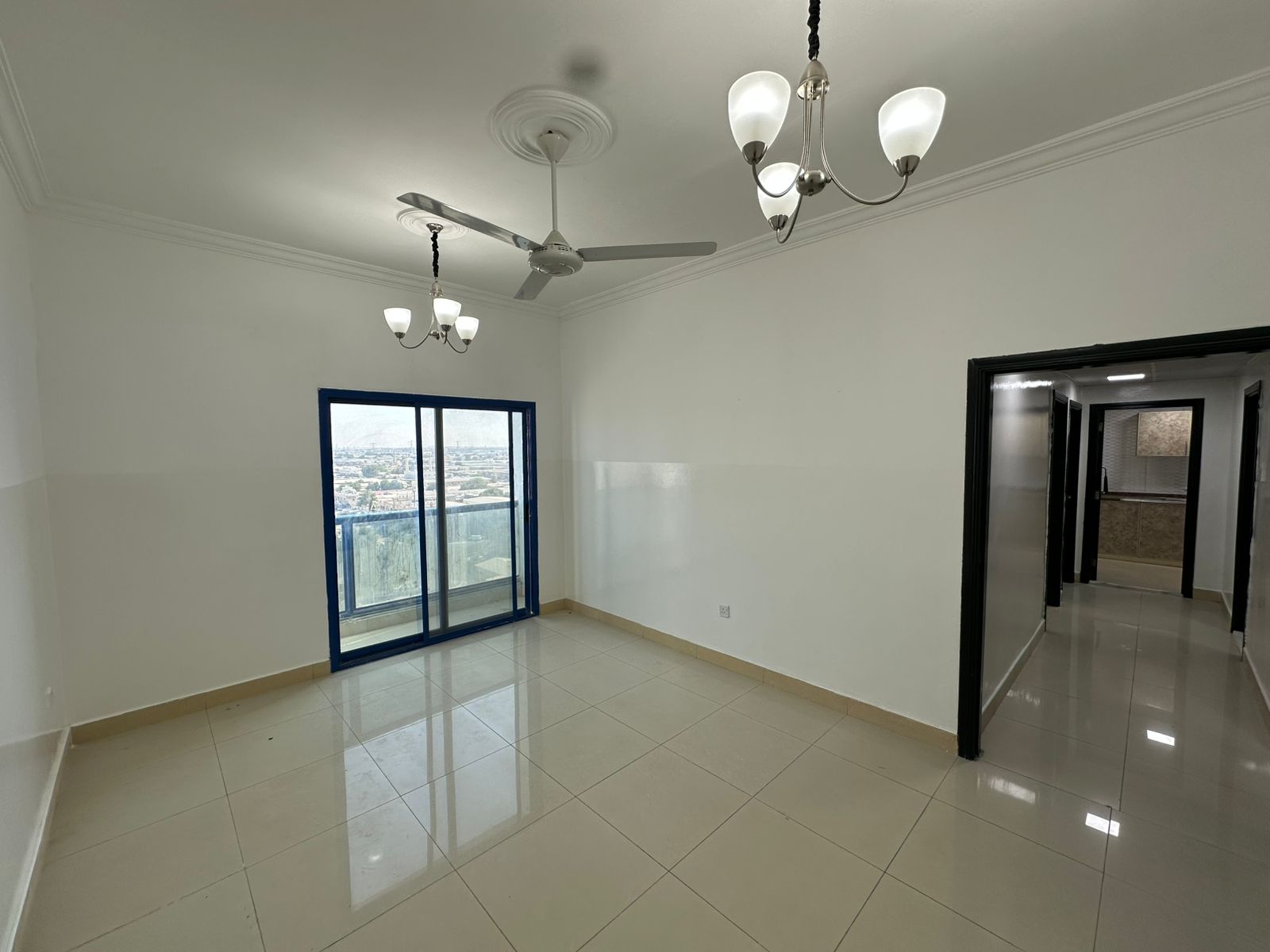 Two-bedroom apartment with a separate living room in Al Nuaimiya 1, on Al Ittihad Road, next to Emirates Markets, near the Dubai exit