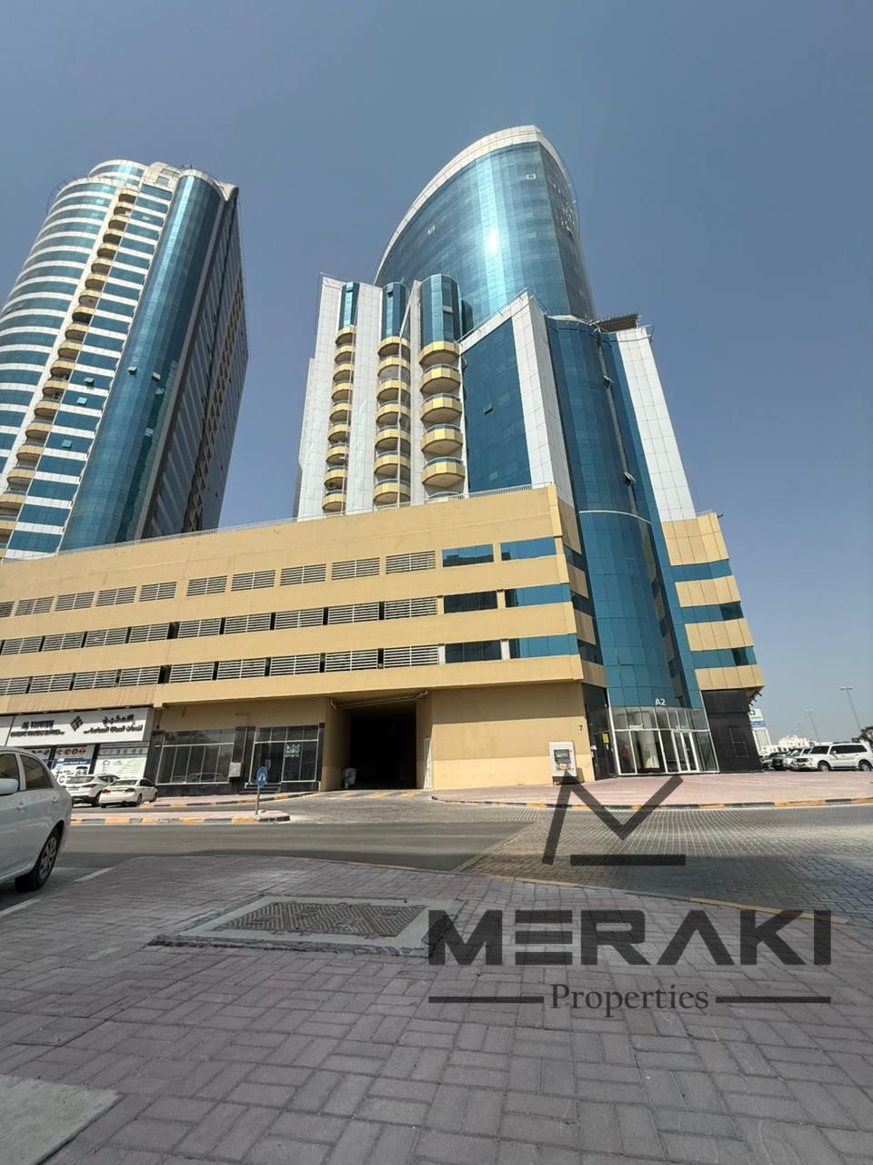 Two bedrooms and a living room with a view of Ajman Creek for 100,000 less