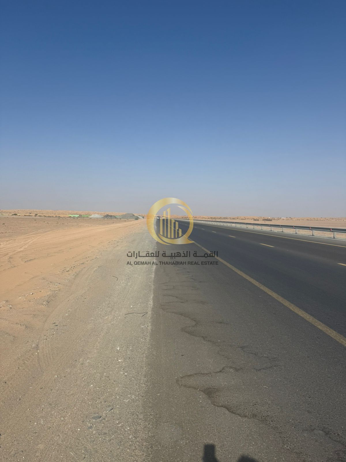 For sale: a plot of land in Al-Sajaa Industrial Area, prime location on Al-Qasimia Road, freehold ownership for all nationalities.