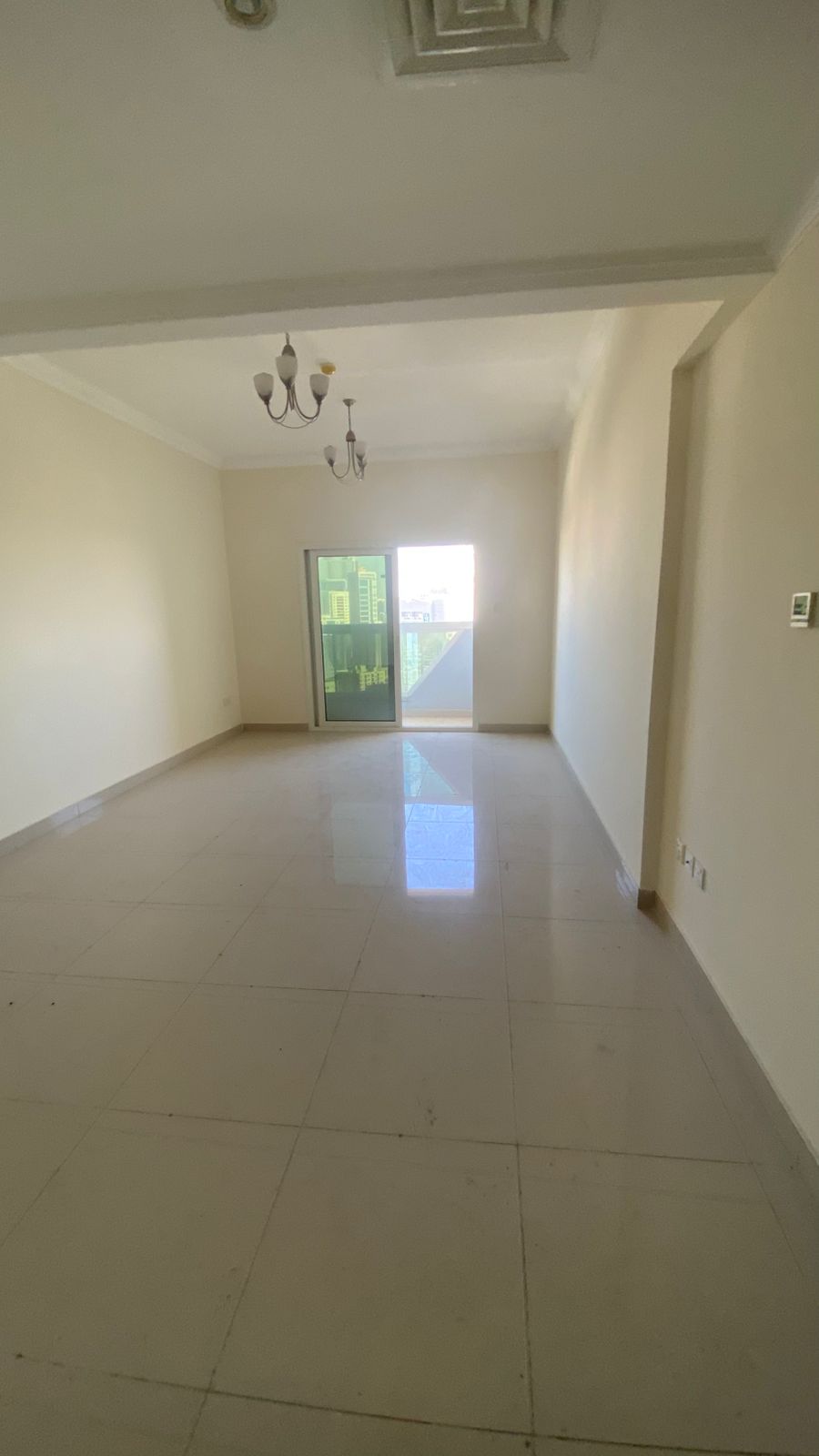 3-bedroom apartment with maid’s room, free parking, family-friendly, Sharjah Al Taawun near Dubai exit.