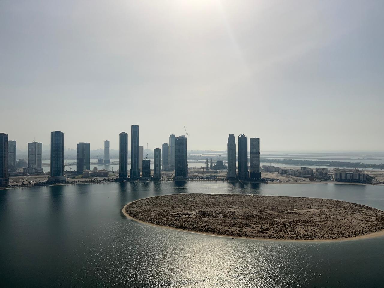 3-bedroom apartment in Al Qasba Al Khan with balcony and free AC, full sea view, master bedroom, 3 bathrooms, gym and pool, flexible payment.