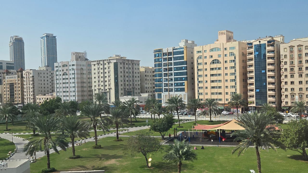 Three-bedroom apartment in Al Majaz with direct park view, two balconies, free parking, fully maintained and ready to move in.