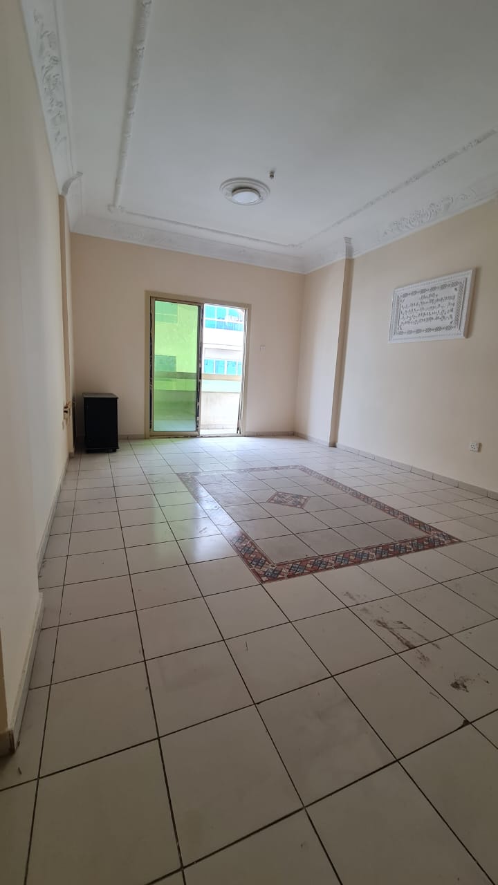 Two-bedroom apartment in Al Qasimia Al Nad with balcony, 2 bathrooms, 36,000 AED.