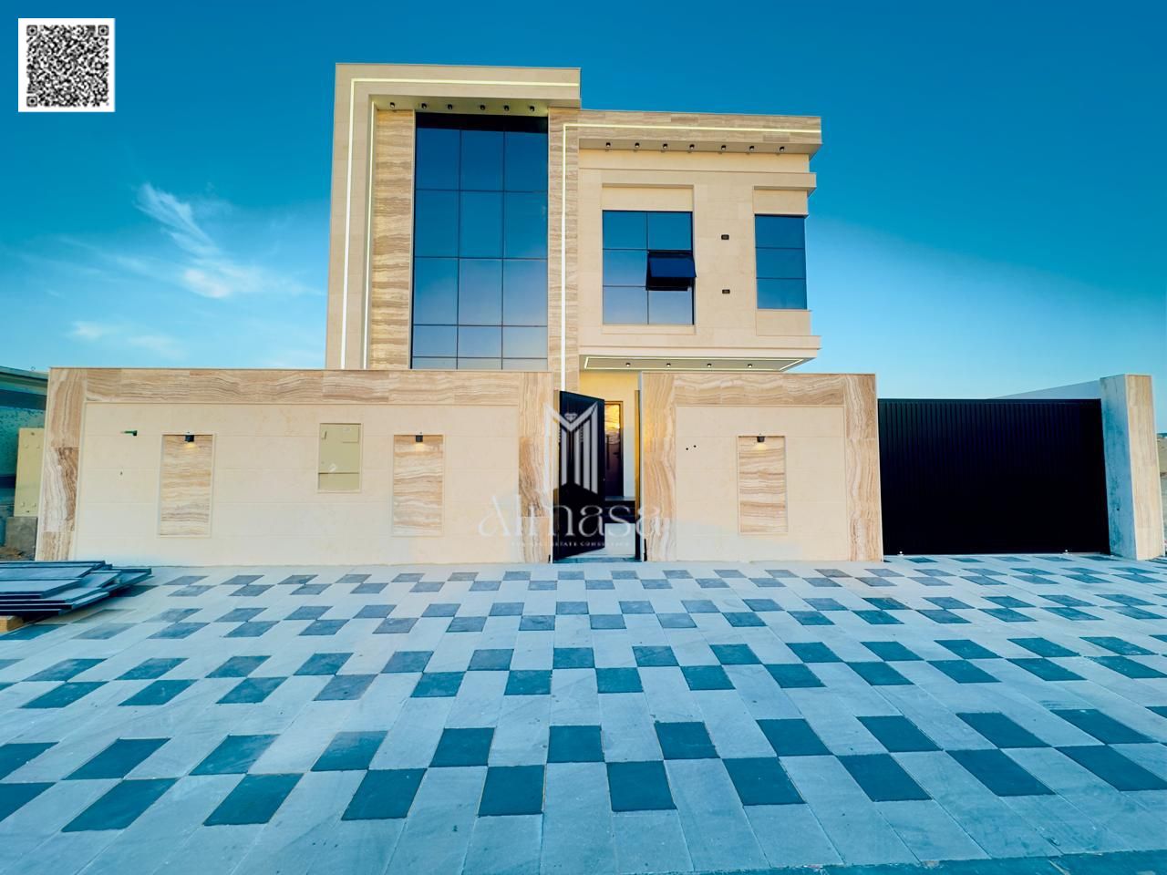 A European-style villa with a terrace overlooking a garden, located near a mosque. Fees include registration, ownership, water, and electricity.
