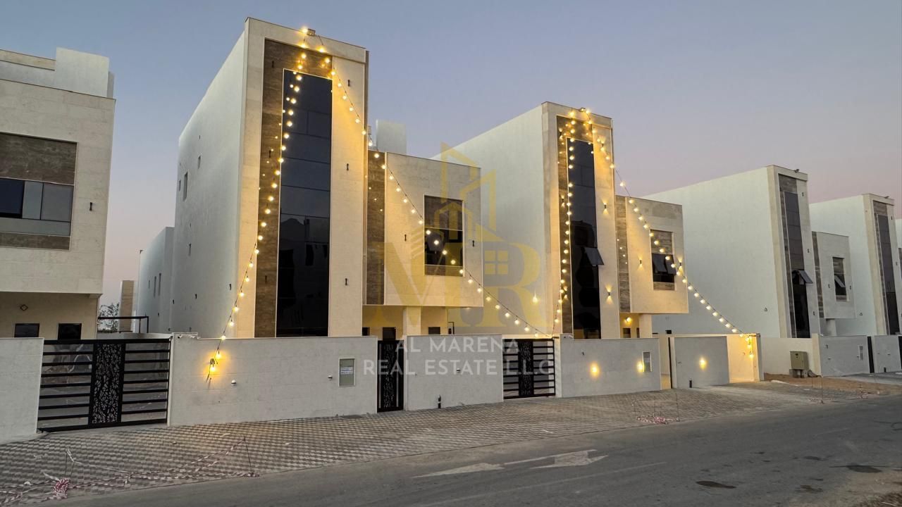 Two-story villa with a roof terrace, featuring 6 bedrooms, including registration and ownership fees. Modern design, opposite a mosque and with direct