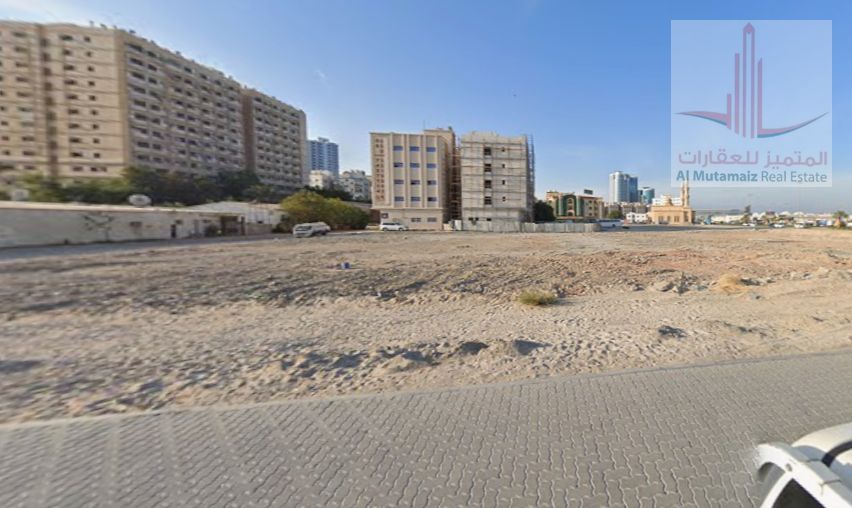 Land for sale in Al Rashidiya 1 area, prime location, residential/commercial permit, ground floor + 12 floors, area 10,170 sq ft