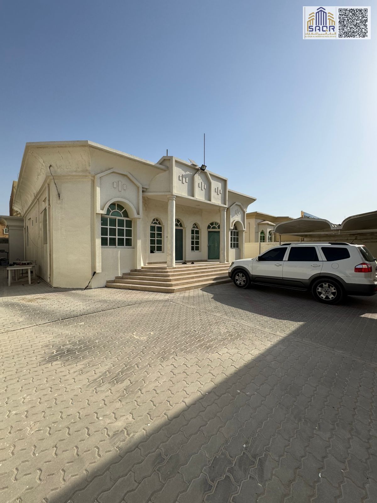 A well-located residential–commercial villa for sale in Al Rawda 2, Ajman, directly on Al Jazair Street, offering excellent visibility and investment potential. • Plot Area: 5,650 sq. ft. • Layout: 3 bedrooms, majlis, and living hall • Usage: Residential