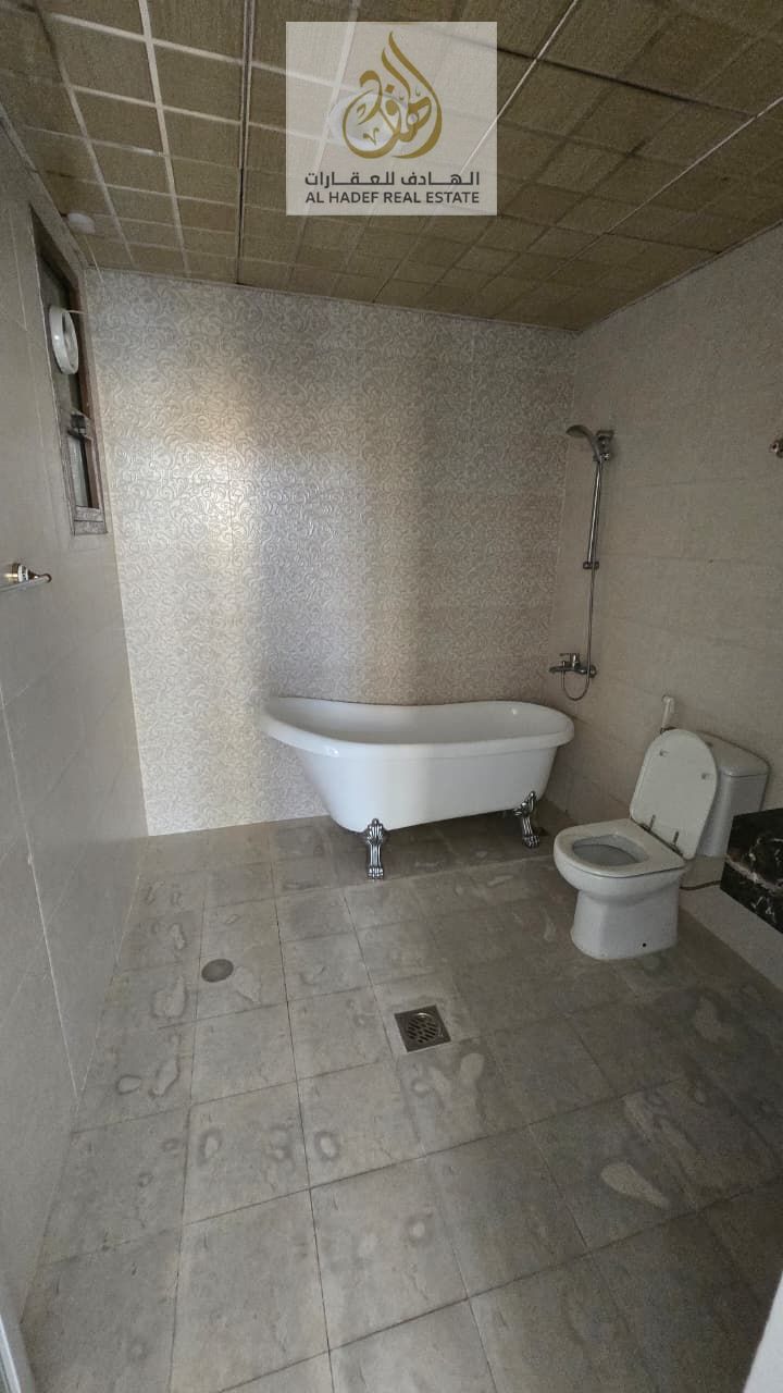One bedroom, living room, two bathrooms, separate living room, large spaces, excellent location near Sheikh Ammar Street, and various finishing touche