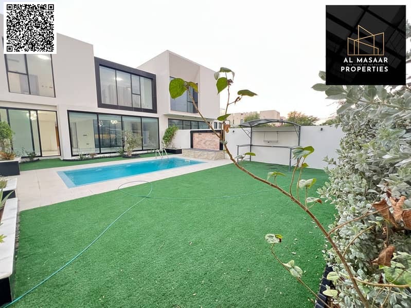 Luxury villa with 4 master bedrooms and a swimming pool for sale in Al Zorah area, Ajman, price includes electricity, water and air conditioning
