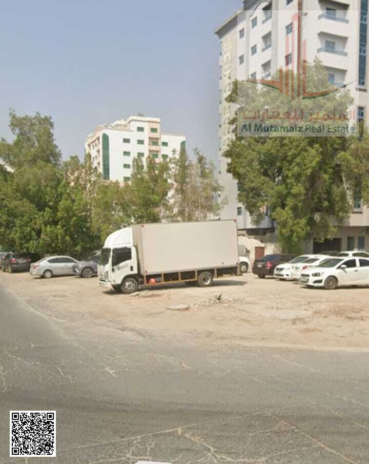 For sale in Ajman: Residential/commercial land in Al Rashidiya 3, corner plot on two streets and an alley, G+10, 6382 sq ft. Asking price: AED 3M
