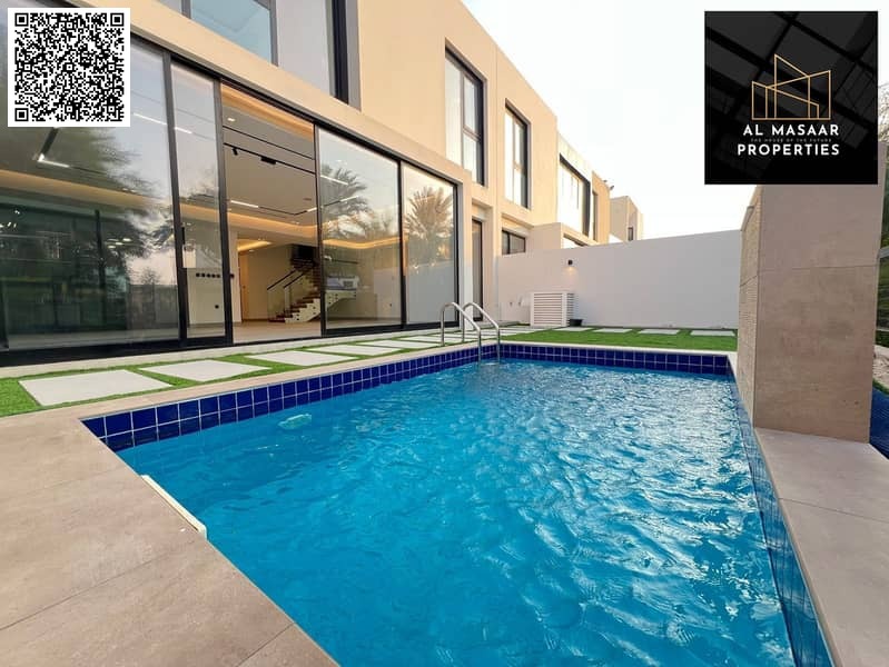 Luxury villa with 3100 sq ft area, private pool, and high-end finishes. Luxury villa in Al Zorah, price includes electricity, water, and air condition