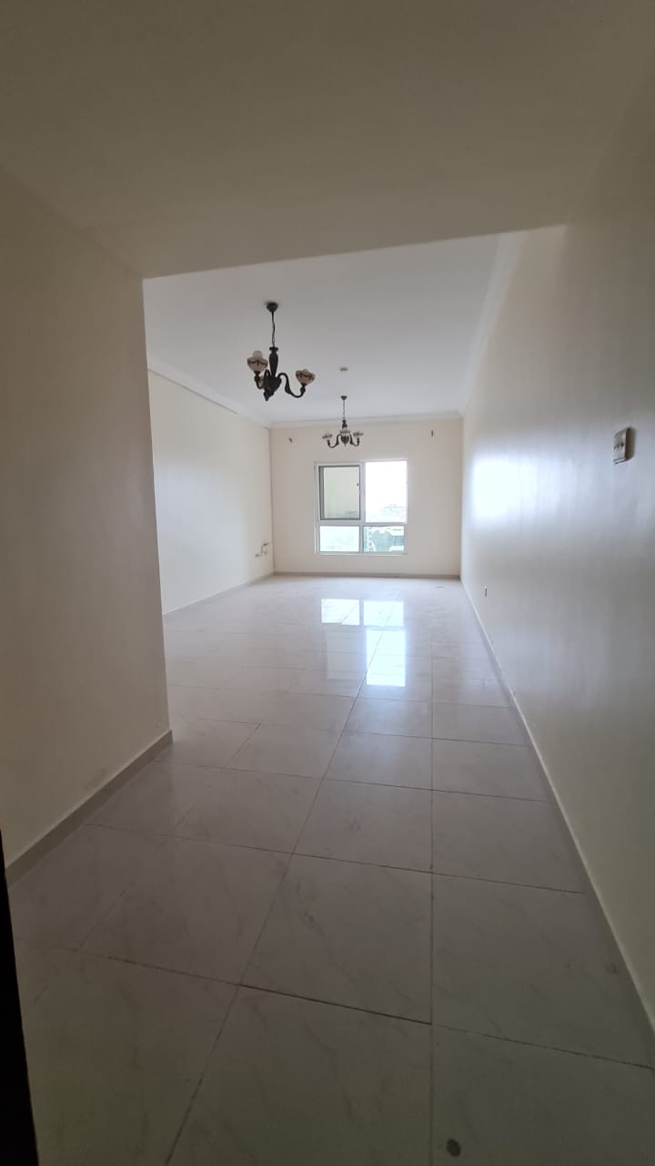 For rent: 1-bedroom apartment with free parking in Queen Tower, Al Qasba. Family-friendly, prime location near all amenities.