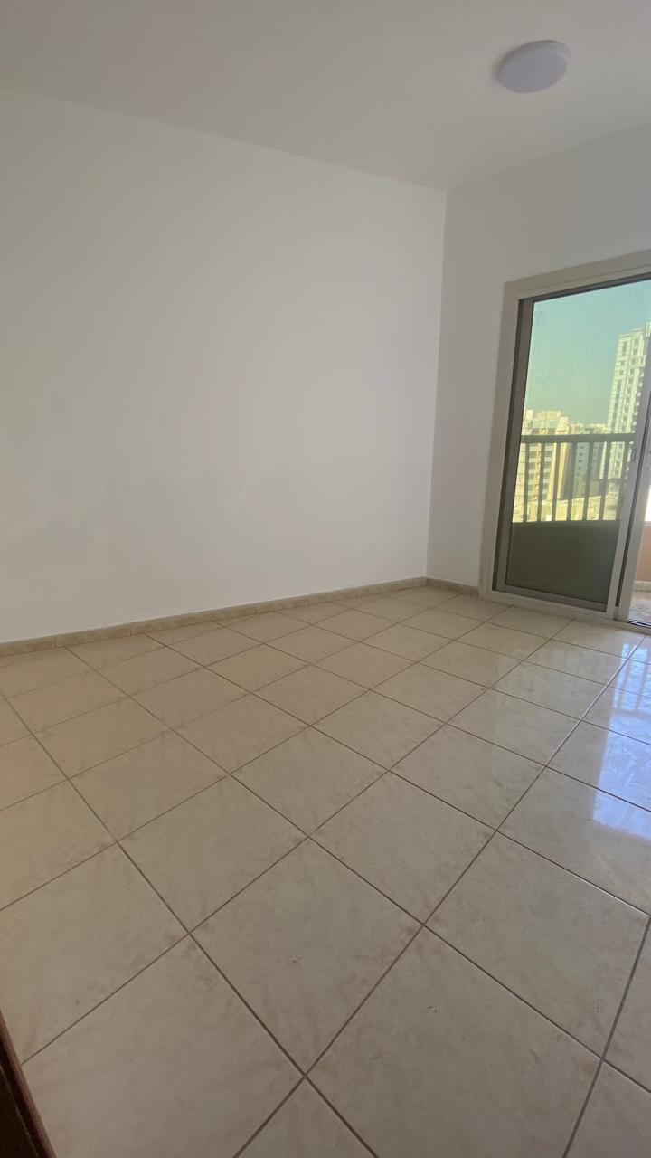 One-bedroom apartment with living room in Al Ghuwaireh, balcony open view, AED 28,000, 4 payments.