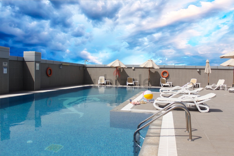 One-bedroom Apts. Monthly 9,500 AED w/ free covered parking