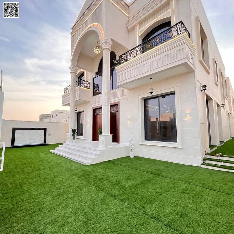 Own a miniature palace in a strategic location near Emirates Bypass Road, two floors and a roof, 5 master bedrooms, luxurious design, at a price that