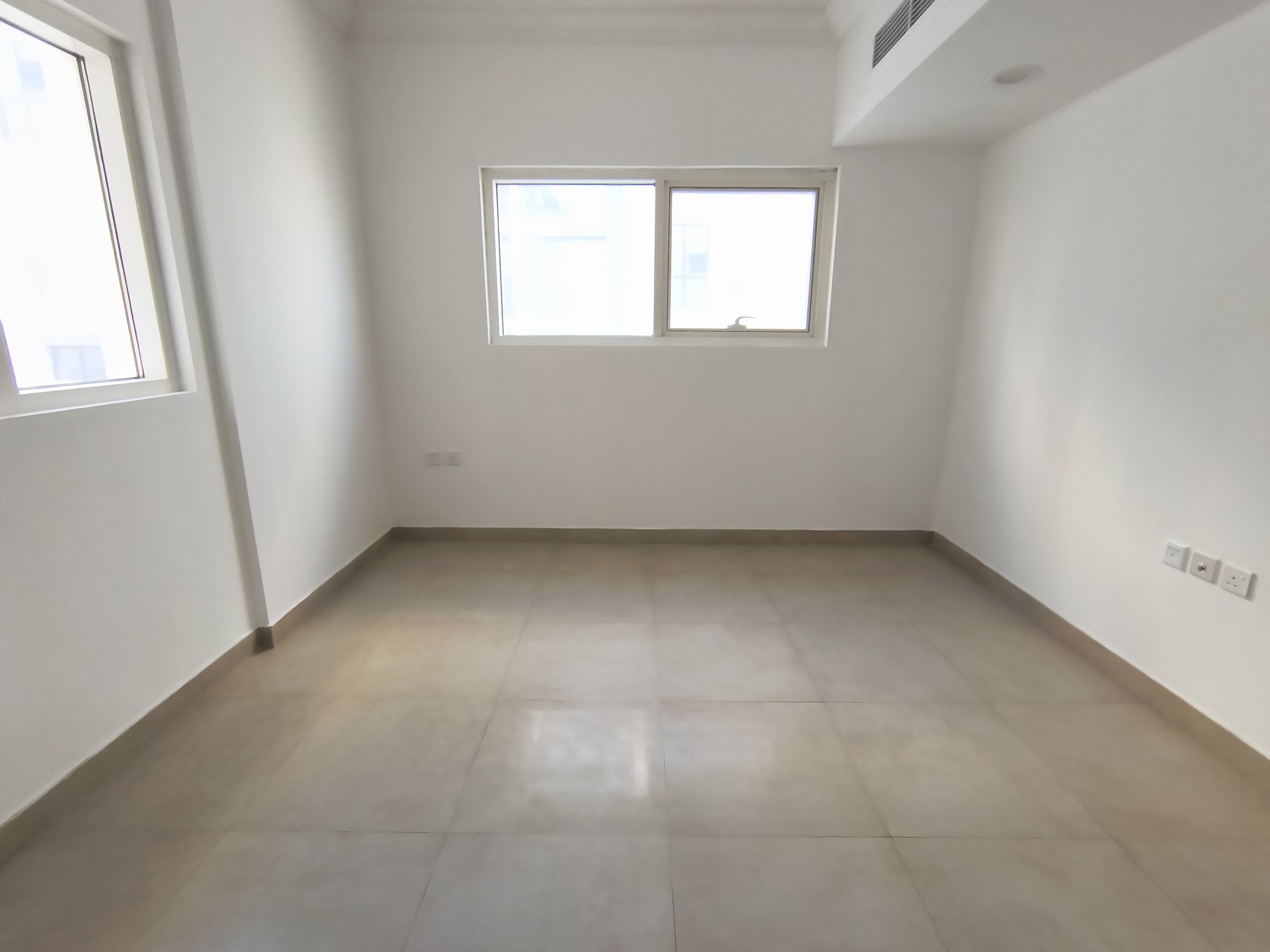 NEW MUWAILEH SPECIOUS BRIGHT 2 BEDROOM WITH CLOSED HALL PARKING INSIDE BUILDING ROAD SIDE BUIL FOR FAMILY READY TO MOVE
