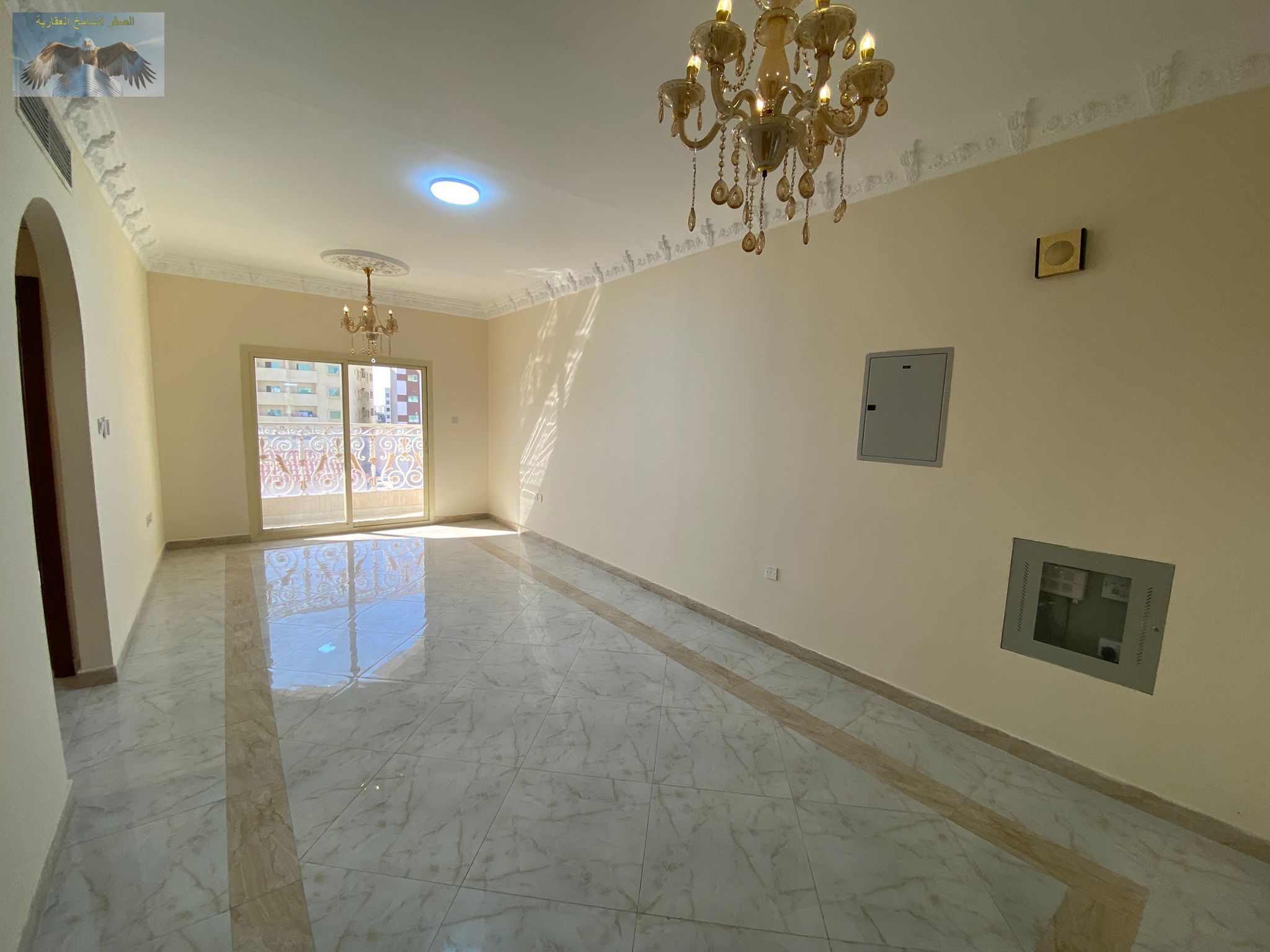 Two bedroom apartment in Al Hamidiya with balcony two bathrooms practical space family friendly close to services flexible rent