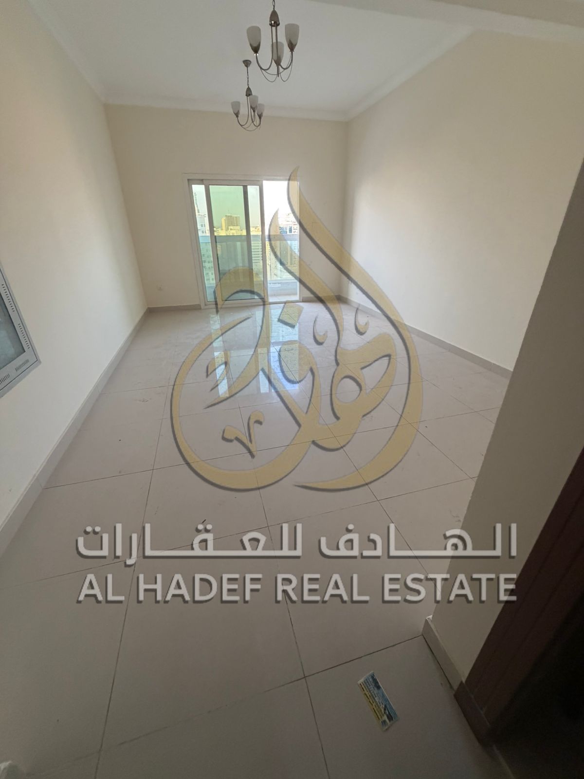 For rent in Sharjah - Al Taawun (on Al Khan Street), two rooms and a hall are available in a prime location in Al Taawun, suitable for families.