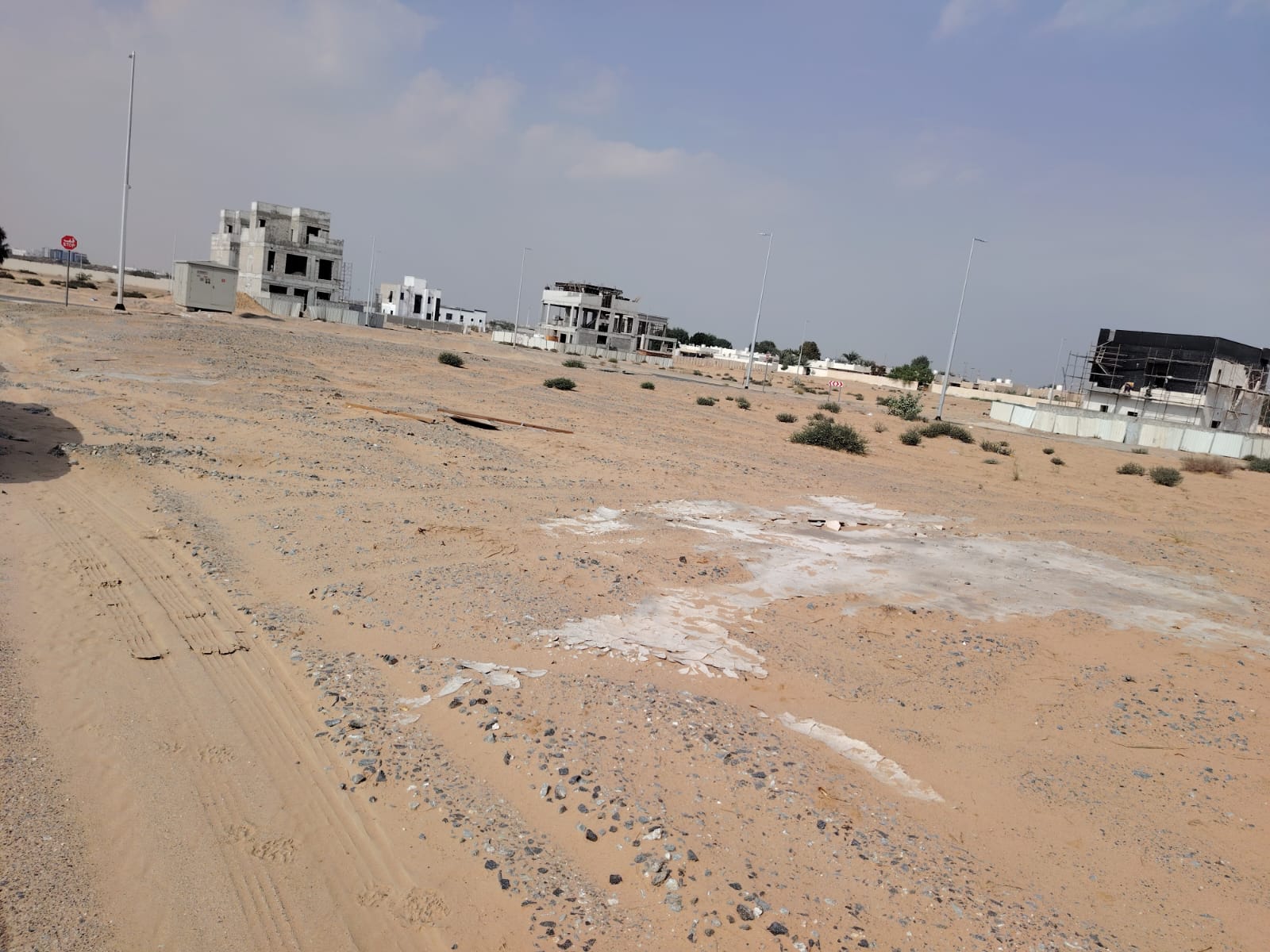 Residential investment land for sale on a 36-meter road in Al Mzeirah, Sharjah