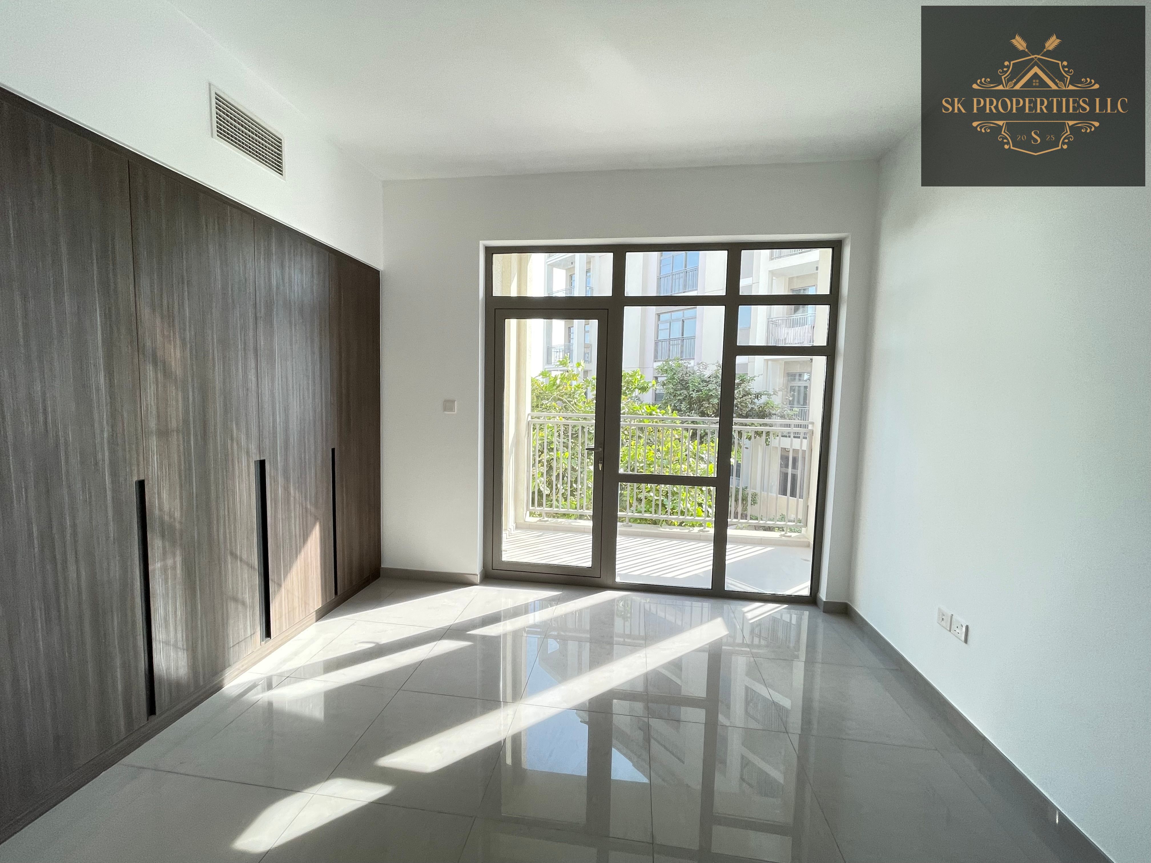 A spacious 1 bedroom apartment prime location in woroud 3 pool view gym with children pool kids play area balcony covered parking