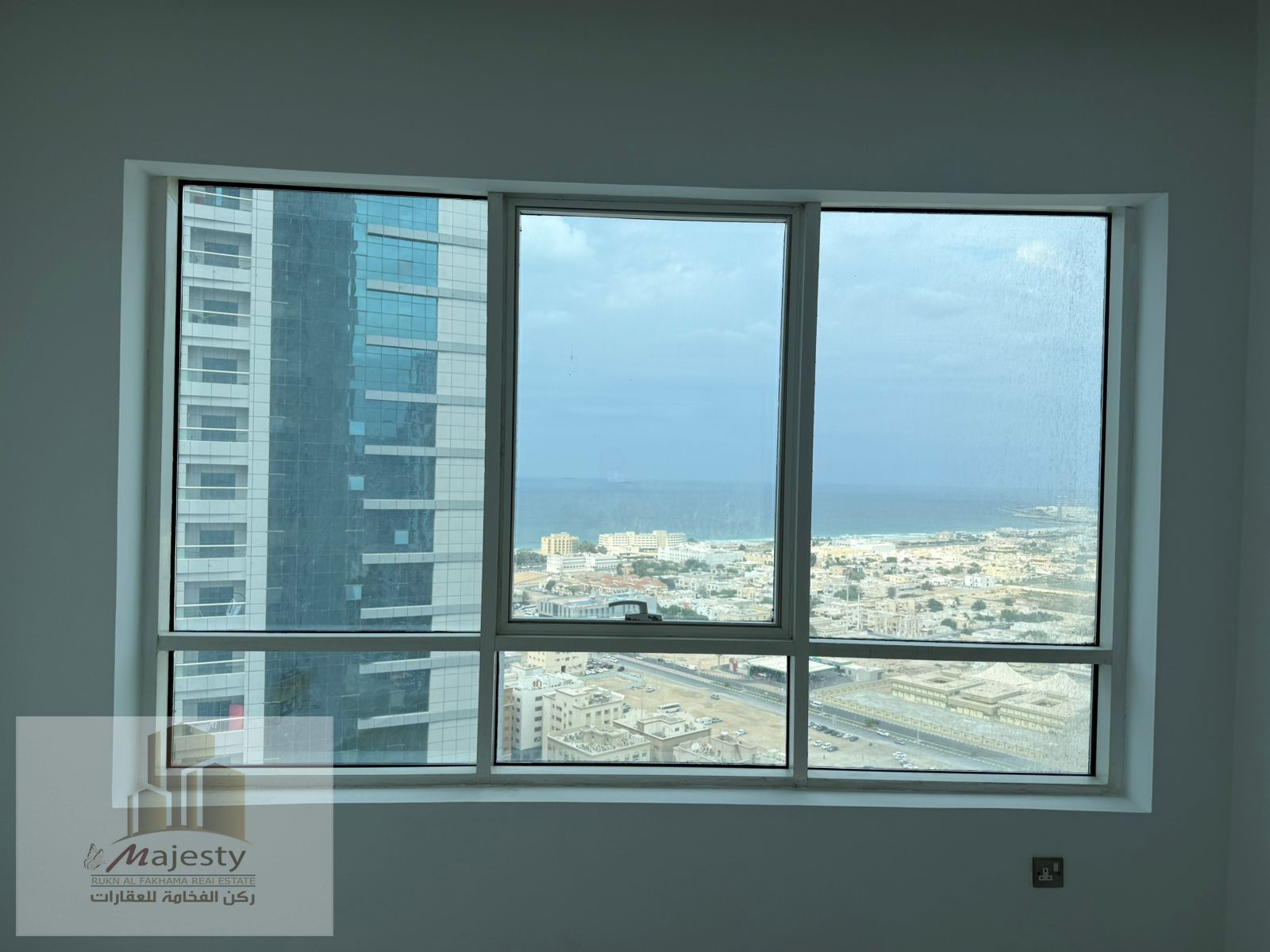 For sale: a quiet apartment with a side view of Al Khan Lake in the Emirate of Sharjah