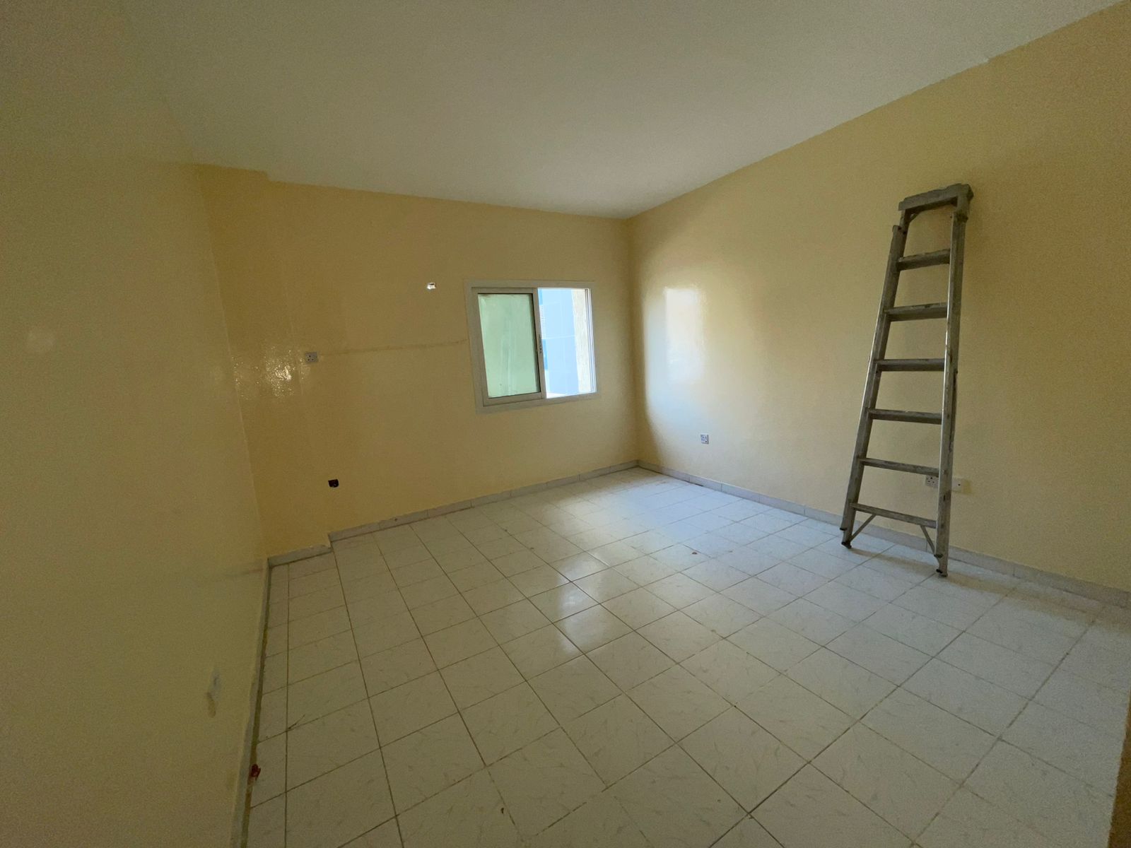For rent in Abu Shagara area, a 2 bedroom apartment with living room, family residence, suitable size, in a prime location close to all services.